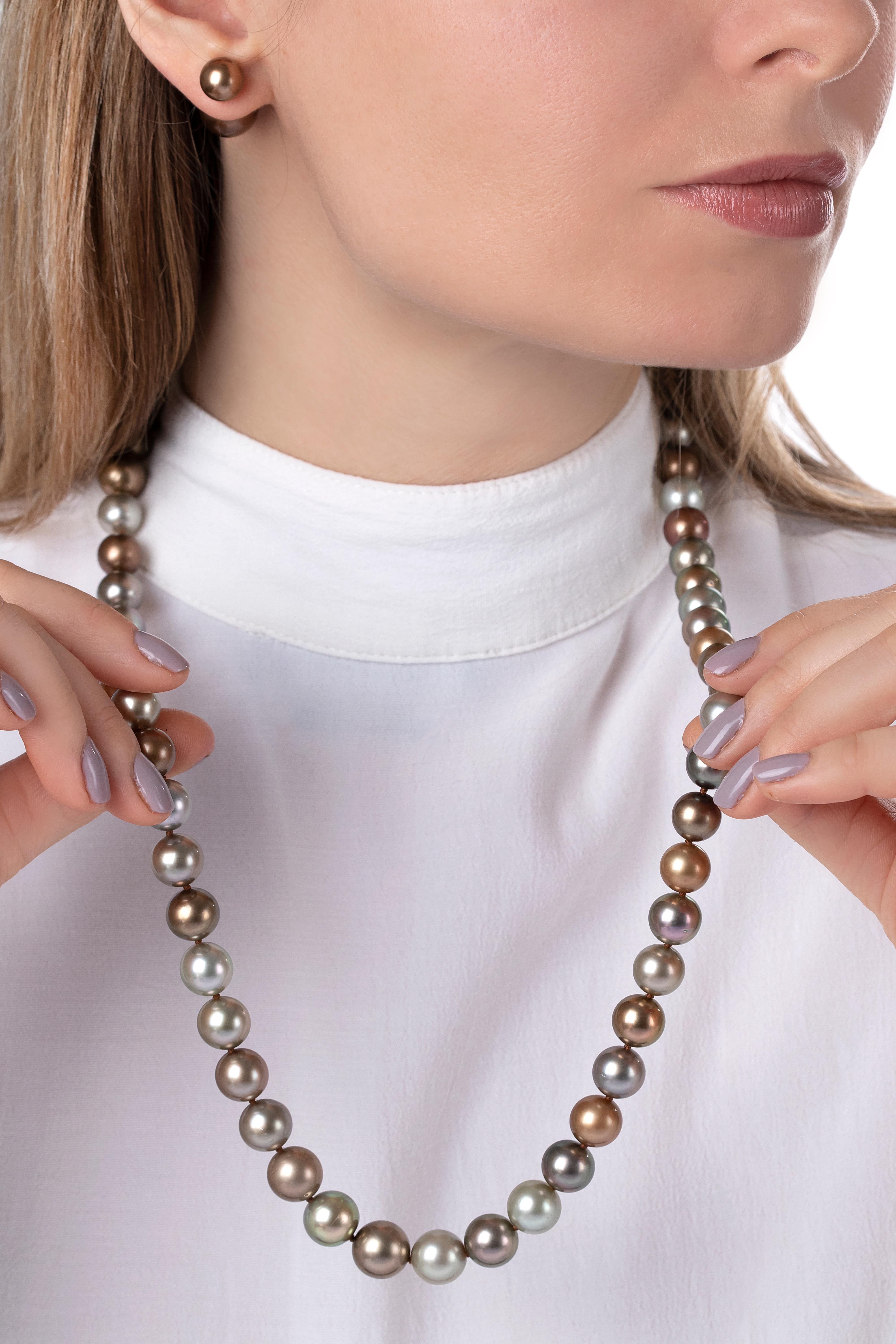 An elegant mix of muted autumnal tones, this long necklace by Yoko London is sure to make a statement with even the most simple of outfits. Each pearl has been hand selected by our artisans to deliver a harmonious sequence of greys, khakis, beige