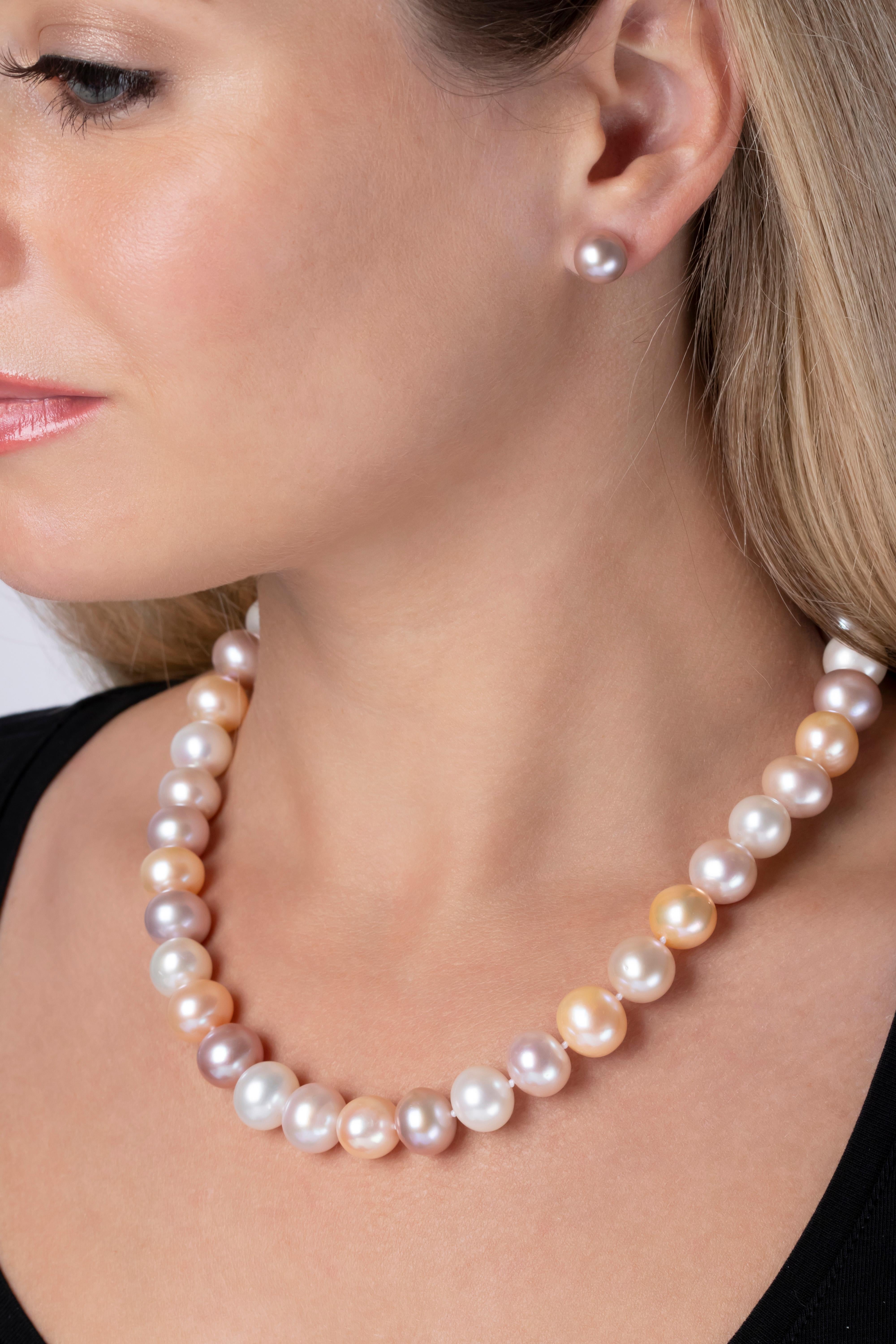 A delightful necklace featuring an array 12-13mm of lavender, peach and white toned freshwater pearls, strung in a classic style on an 18K white gold ball clasp. 
Every classic necklace by Yoko London is customisable, so please contact us if you