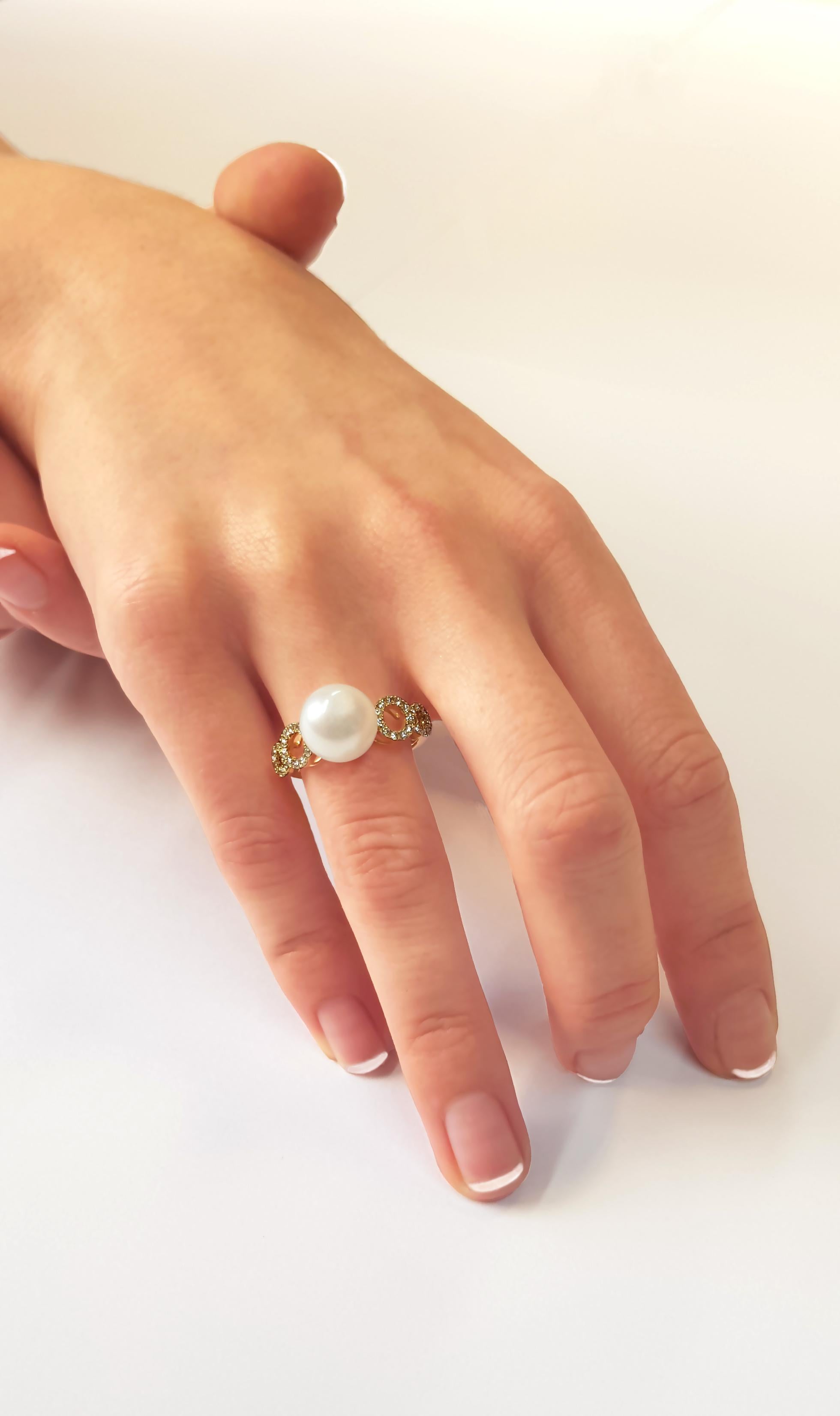 A lustrous freshwater pearl is elevated by contemporary circles of diamonds in this unique ring by Yoko London. An understated yet strikingly modern design, this lovely ring will look elegant paired with both daytime and evening looks. 

Each piece