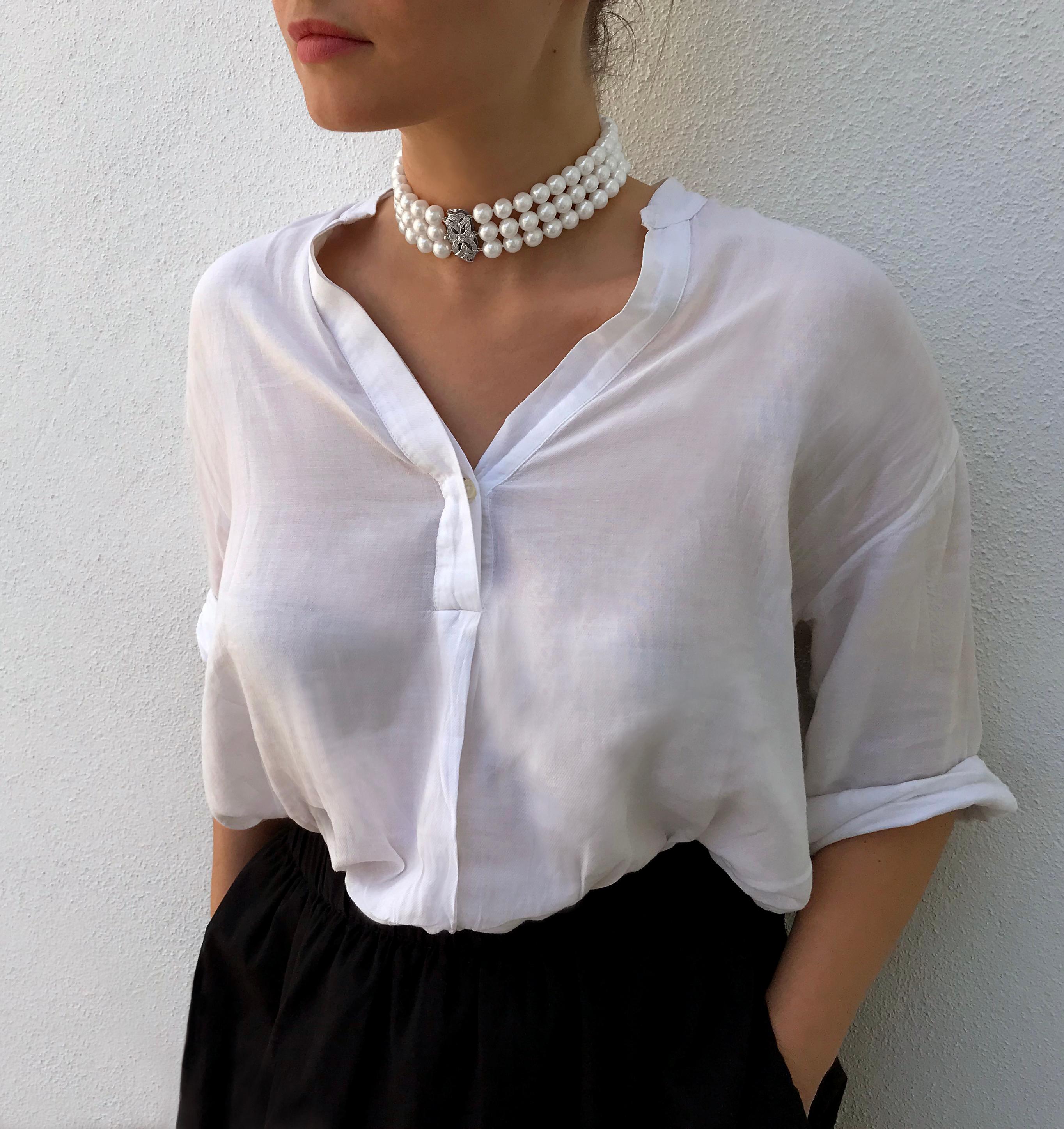 This stunning choker by Yoko London features three rows of lustrous Cultured Freshwater Pearls, which have each been hand selected by our Pearl Experts. The Pearls are secured to an intricate Diamond set 18 Karat White Gold clasp, which is