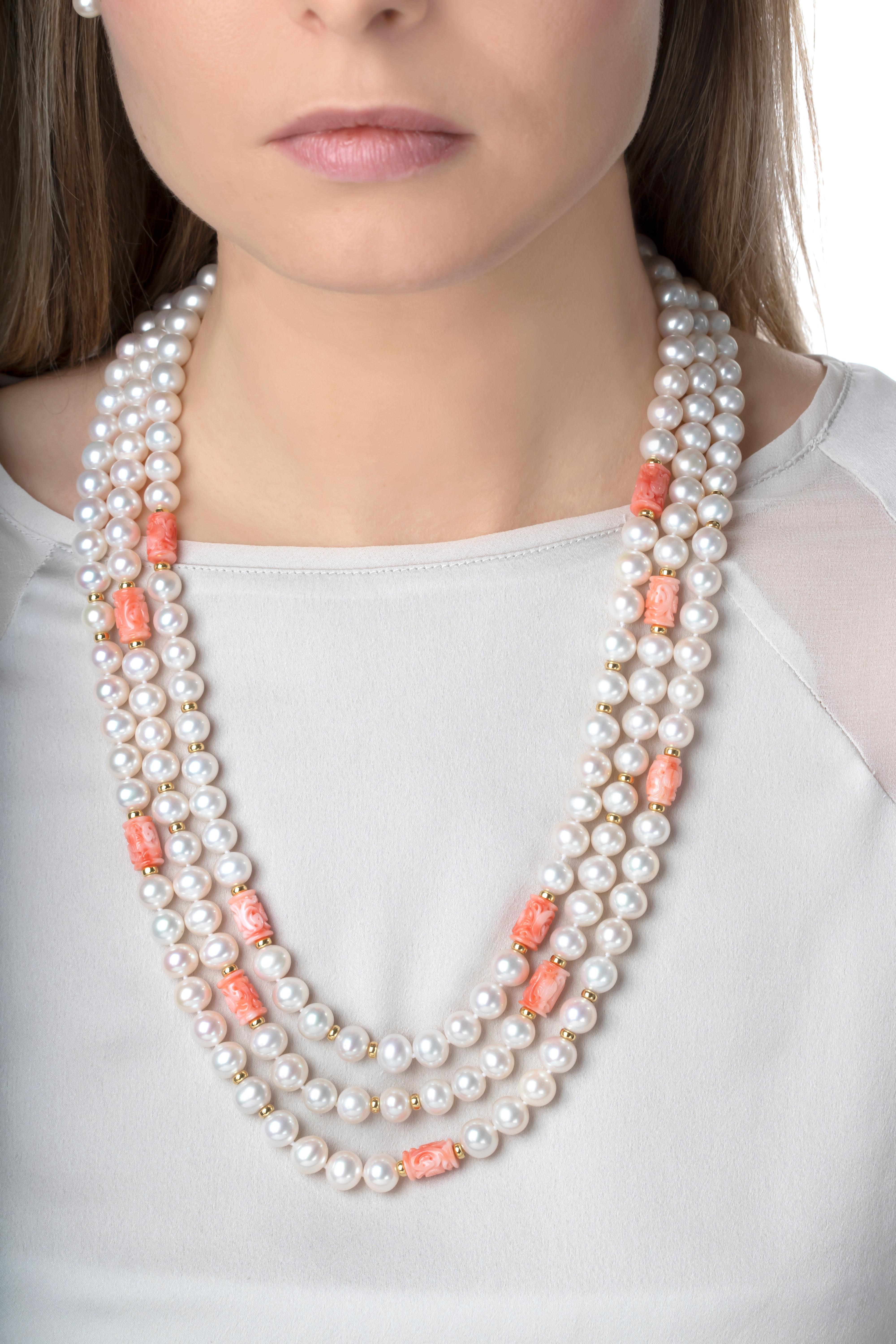 This 18K yellow gold necklace by Yoko London features three rows of expertly matched Freshwater pearls, which are perfectly enriched by the pastel hues of the carved coral beads. The soft colours showcased in this unique necklace make it truly