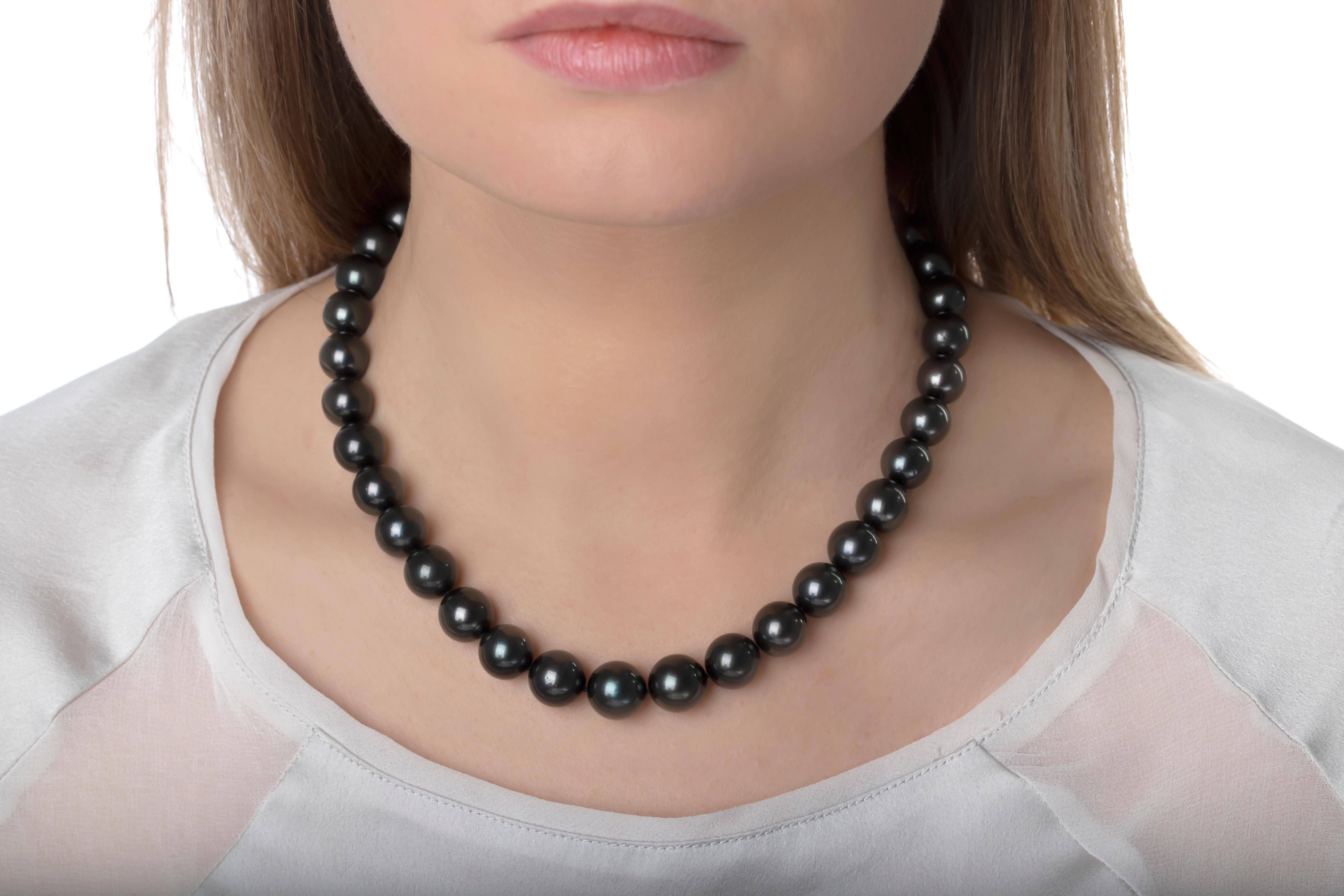 This elegant necklace by Yoko London features spectacular Tahitian pearls which softly graduate in size from 10mm to 12.6mm, set on an 18 karat white gold clasp. This timeless necklace will add a striking touch to both daytime and evening looks. 

-