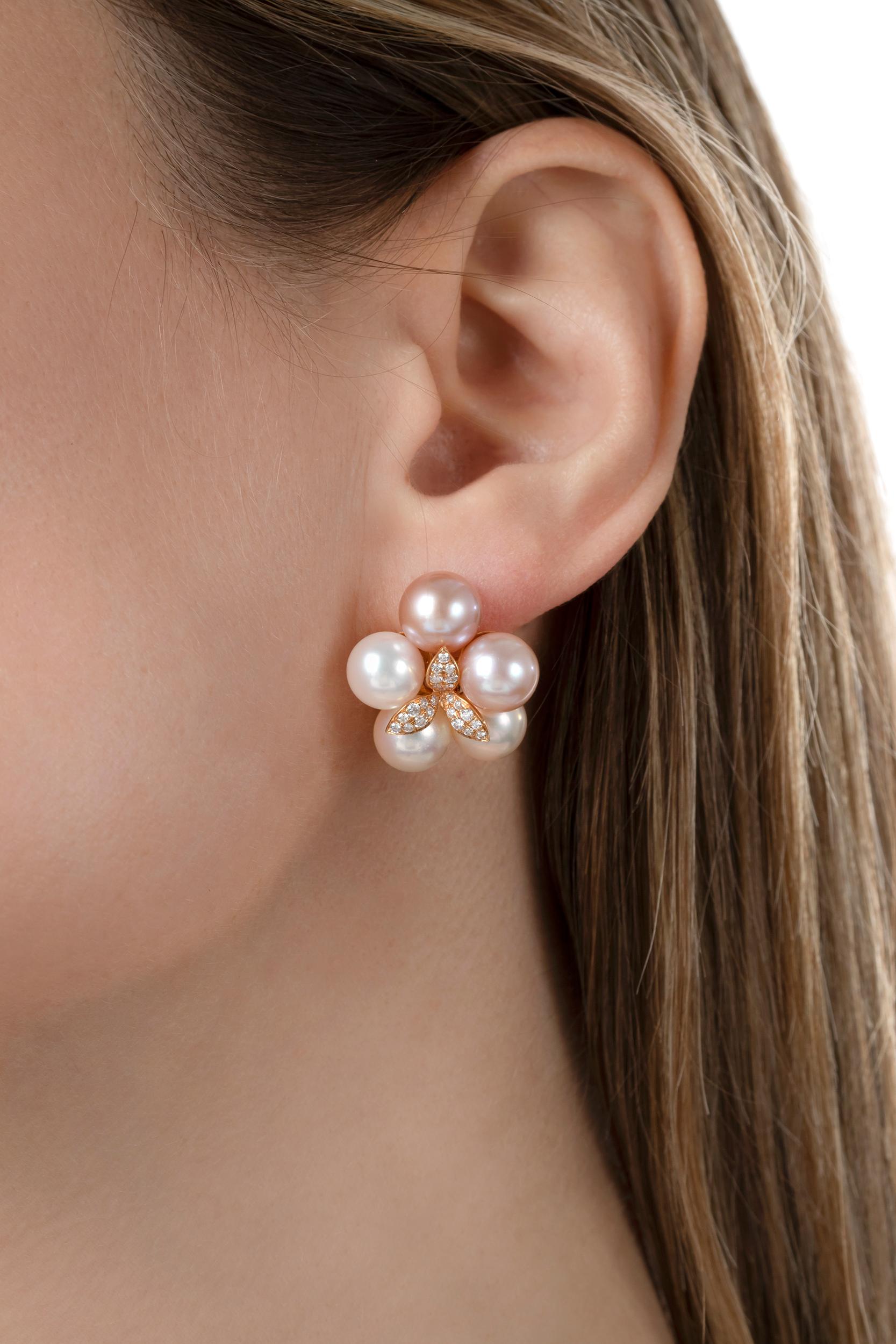 Beautiful earrings from Yoko London featuring a delicate colour palette of pink and white pearls, perfectly formed into a flower-shaped cluster and enhanced by diamond-set 18K Rose Gold. Style these earrings with sleek outfits for a perfectly