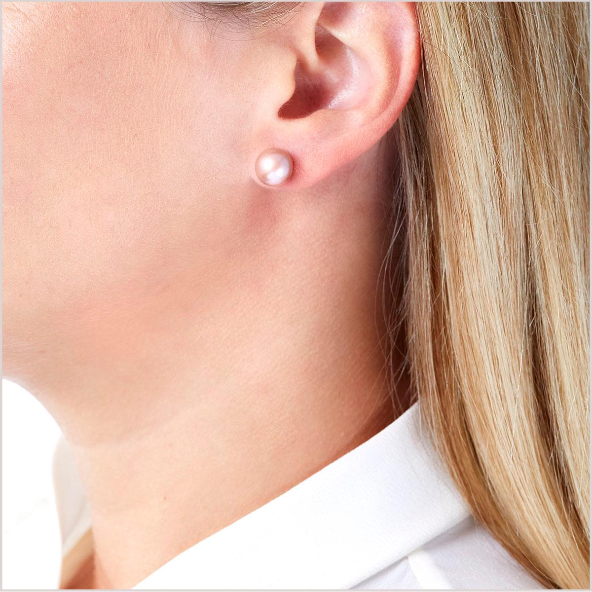 Set on luxurious 18 Karat White Gold, this pair of Yoko London Earring Studs features two pretty Pink Freshwater Pearls at their forefront, which have been hand-selected for their soft hue, gleaming lustre and smooth surface appearance.  
Style with