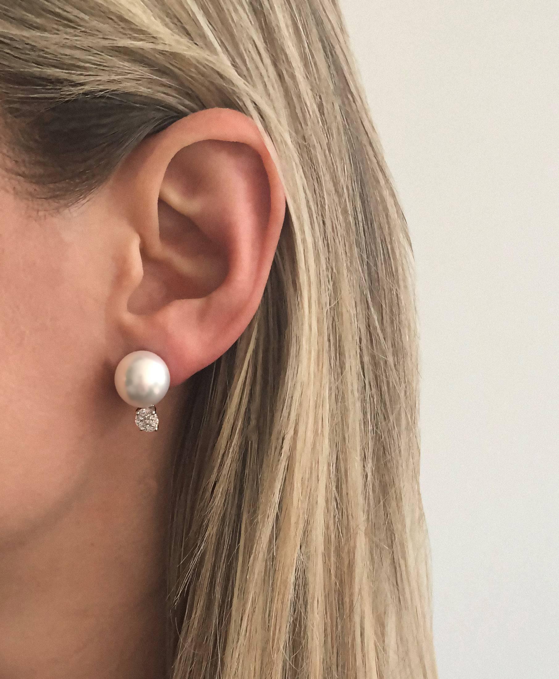 pearl and diamond earrings on ear