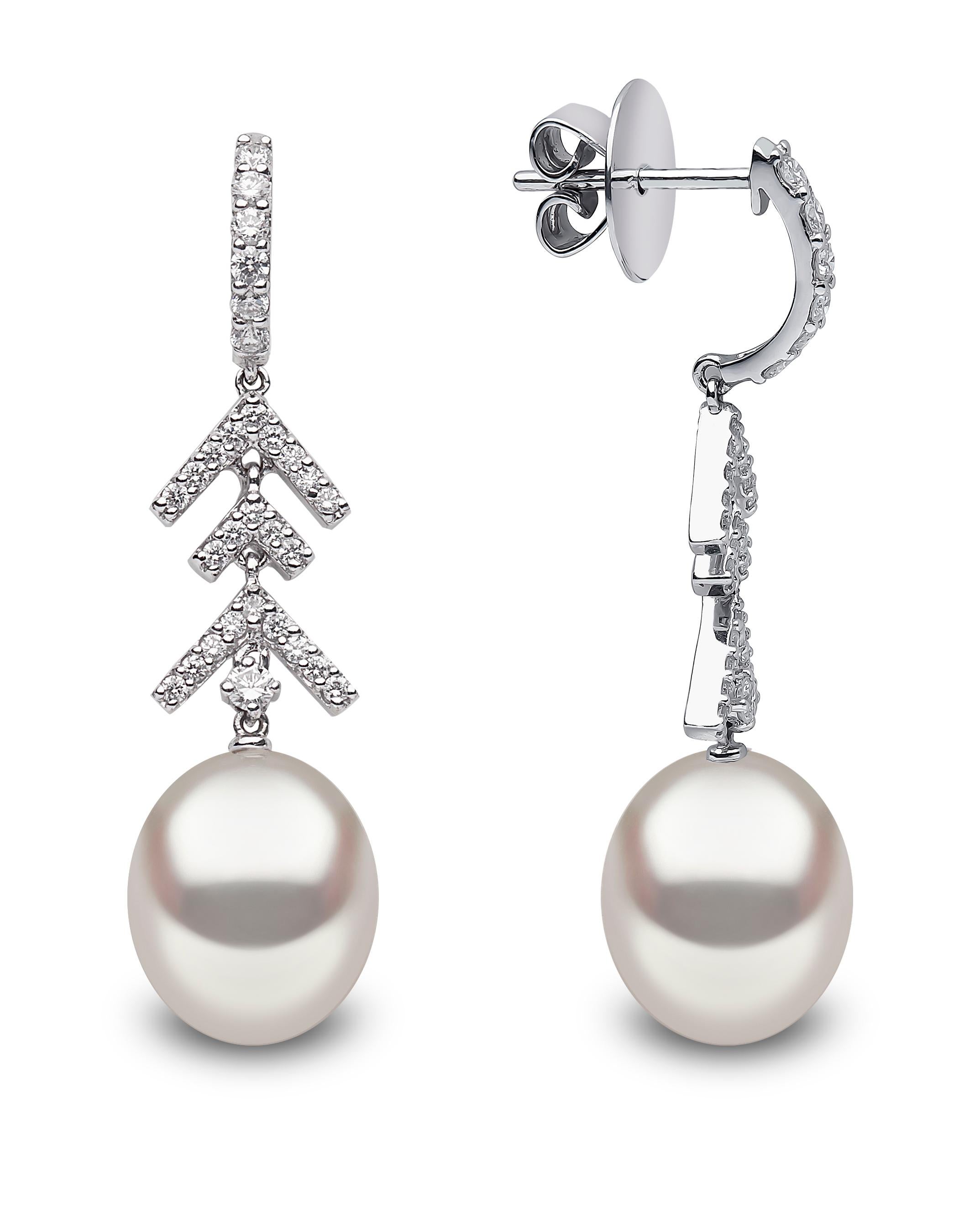 These striking earrings by Yoko London feature lustrous 11-12mm South Sea pearls beneath diamond arrows. Masterfully engineered, these earrings have been designed to move with their wearer to ensure a continuous sparkle whenever they are worn. Pair