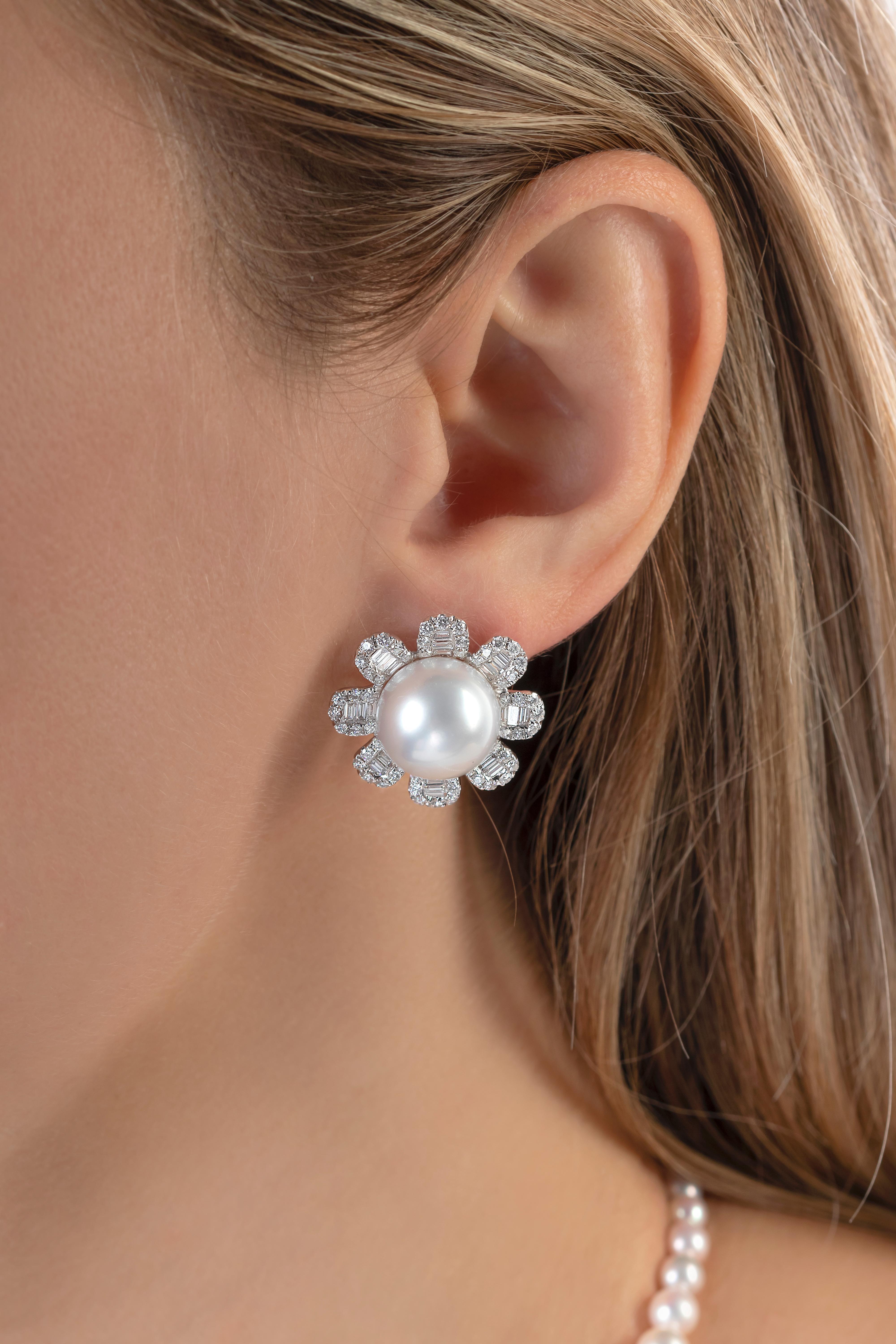 These unique earrings by Yoko London feature lustrous South Sea pearls set in the centre of scintillating diamond petals. The South Sea pearls have been selected for their high lustre and set in our London atelier. The perfect companion for any