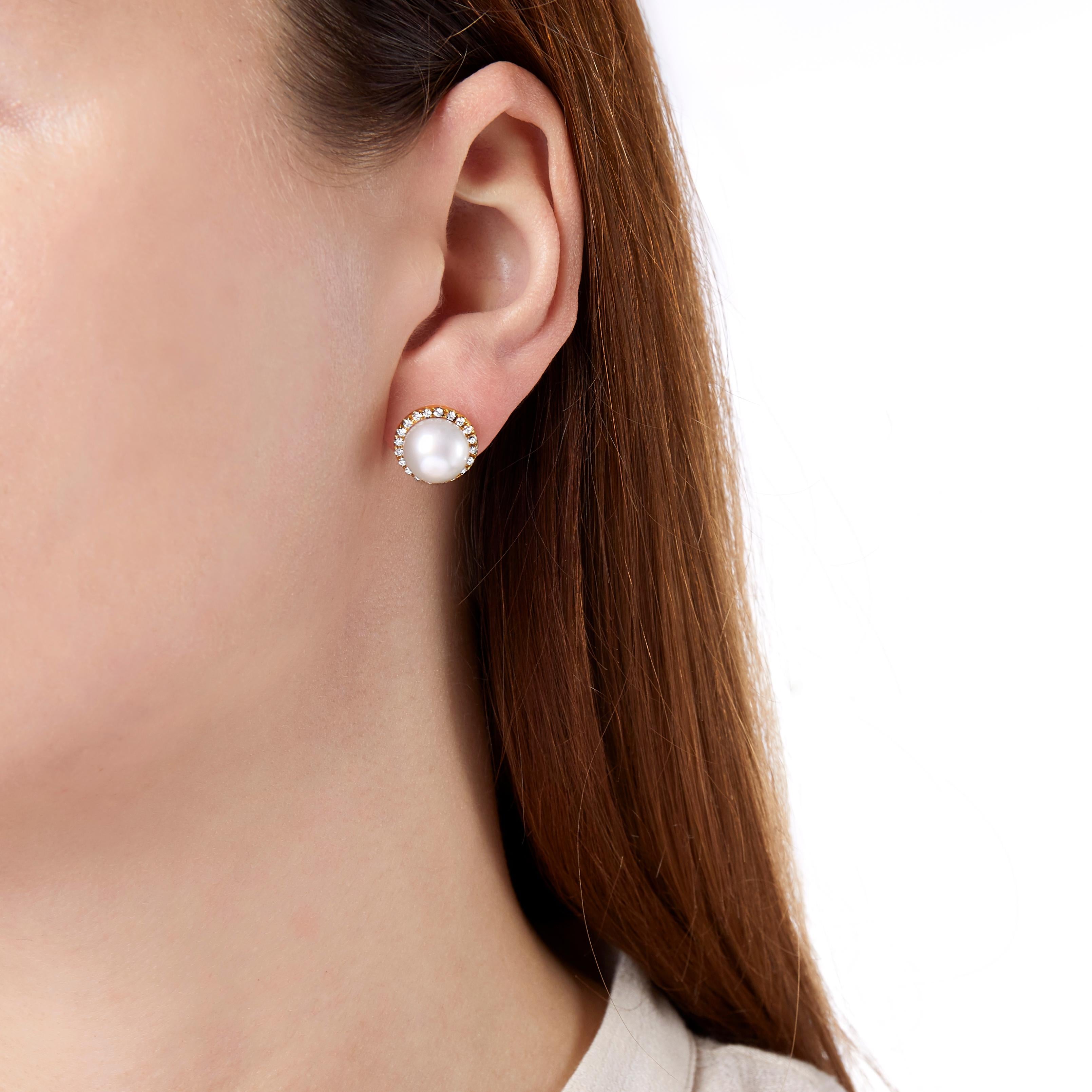 These striking earrings by Yoko London feature South Sea pearls surrounded by a halo of diamonds. Flawlessly engineered in our London atelier, these elegant earrings are perfect for pairing with both daytime and evening outfits – they would make a