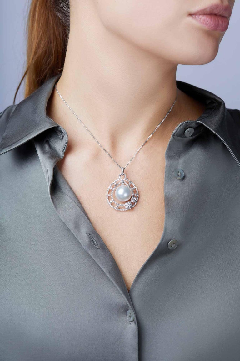 This beautiful pendant has been designed with a lustrous South Sea pearl suspended between a decorative diamond and white gold design. This pendant will brighten up any occasion. 

- 15-16mm South Sea Pearl 
- 1.93cts of Diamonds 
- 18k White Gold