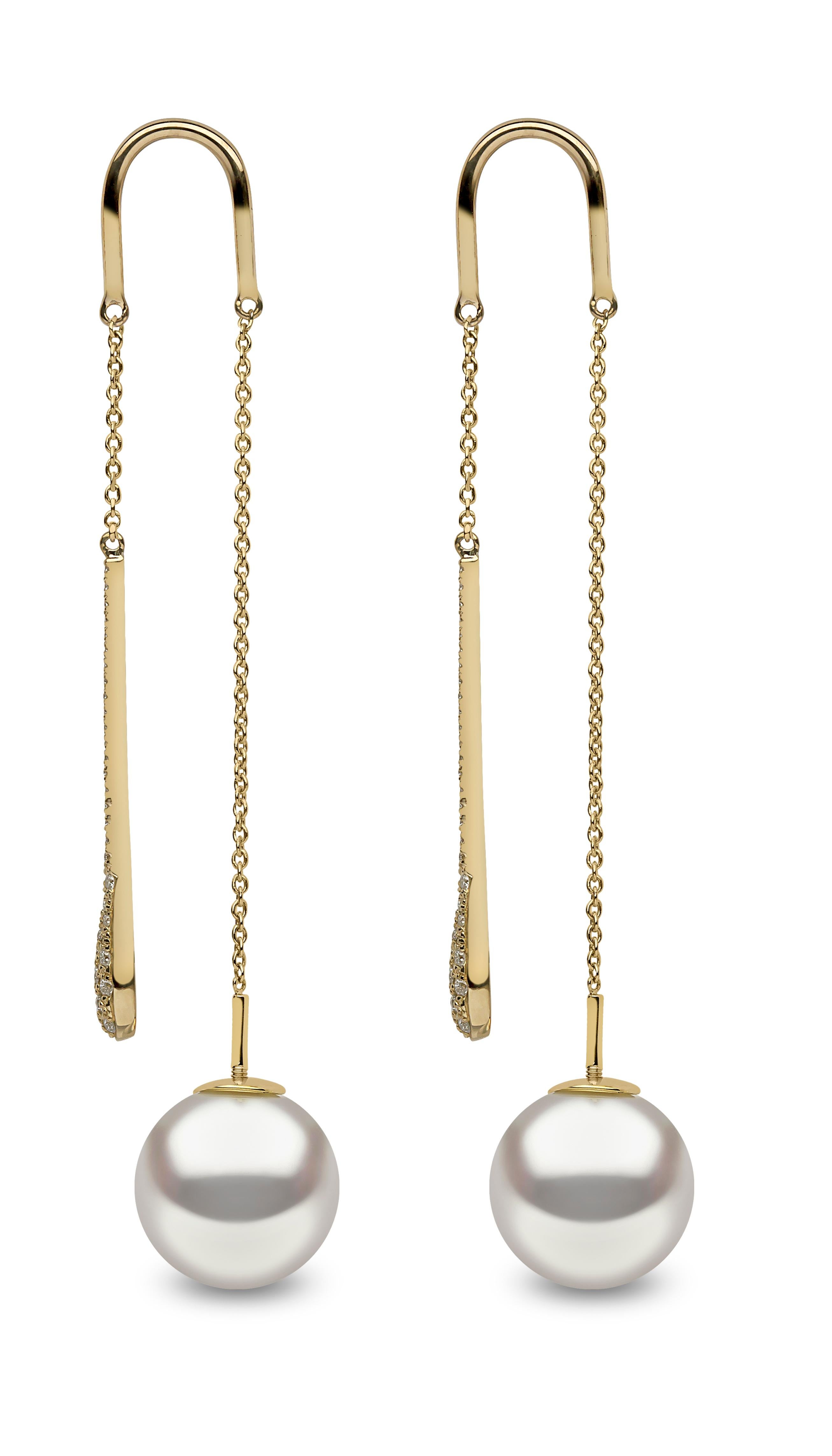 These contemporary earrings by Yoko London are extremely modern in their design. Featuring an elegant diamond drop which hangs from the front and a lustrous South Sea pearl which hangs from behind the lobe. To put these earrings on, you simply