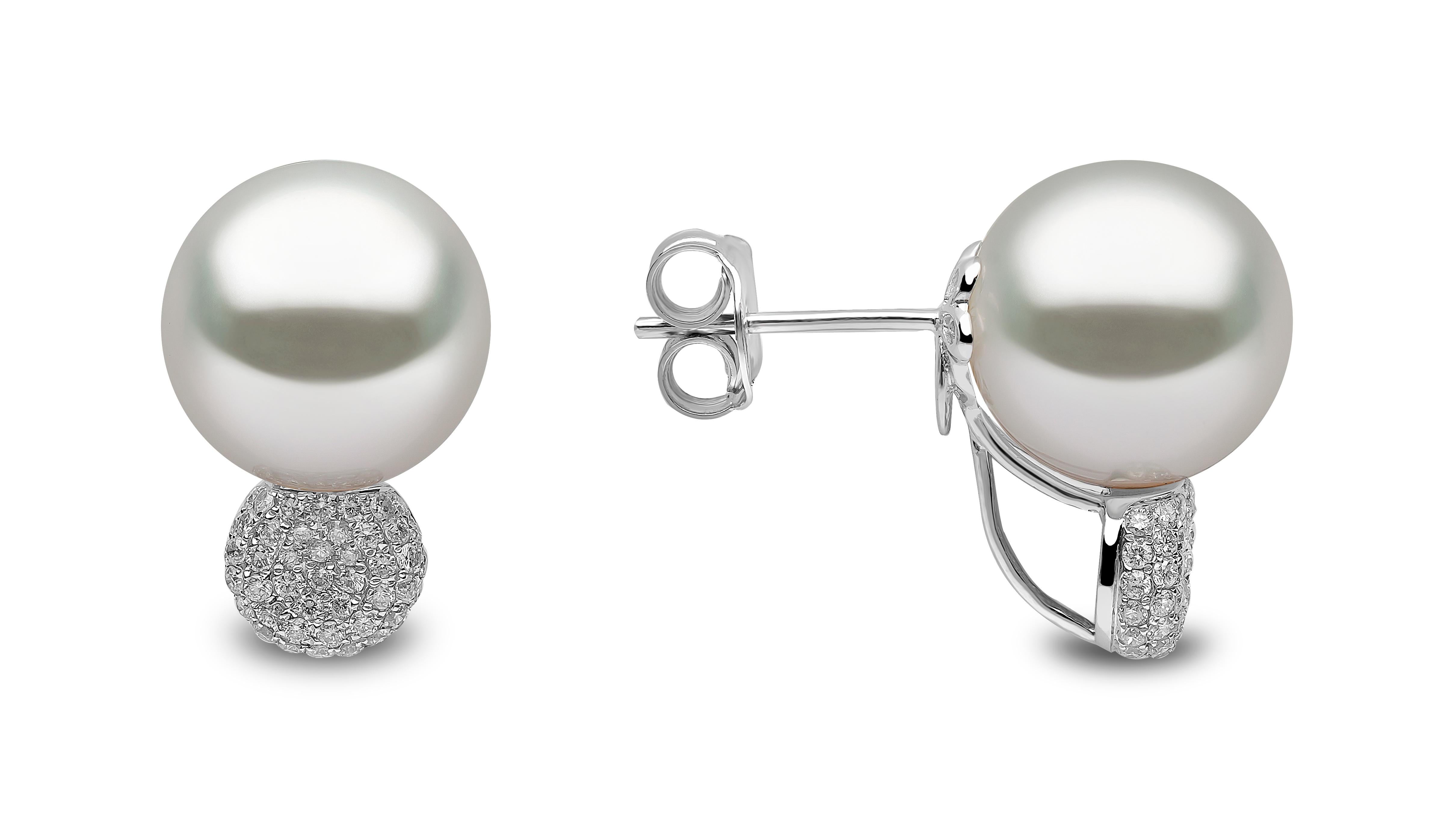These elegant earrings by Yoko London feature lustrous South Sea pearls atop a cluster of dazzling diamonds. Set in 18 Karat white gold to enrich the radiance of both the pearls and the diamonds, these earrings utilise a classically beautiful