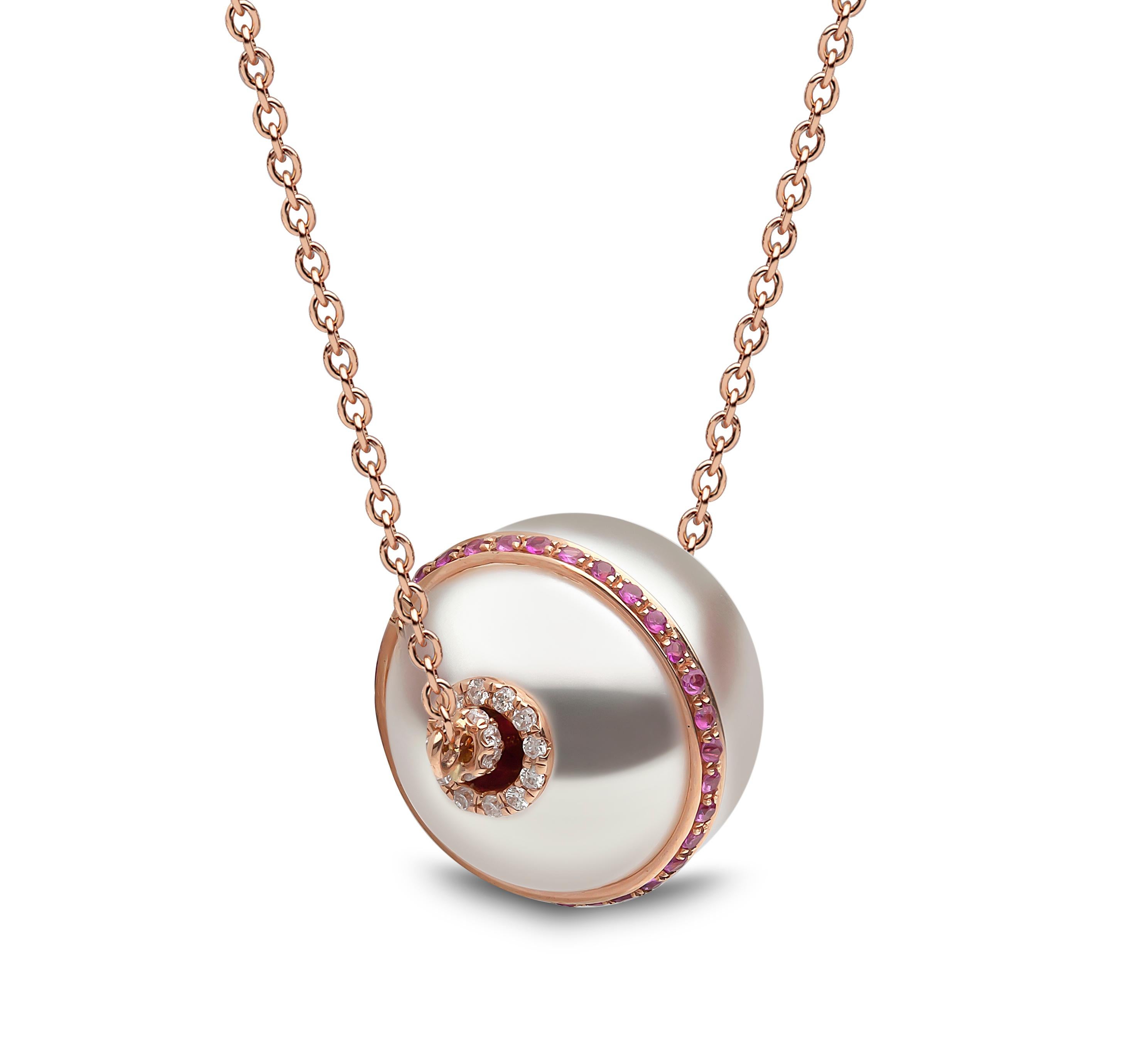 This remarkable necklace by Yoko London features a ring of rubies orbiting a lustrous South Sea pearl. This elegant necklace demonstrates the remarkable workmanship of our London atelier, which is evident especially in the bayonet fastening. To