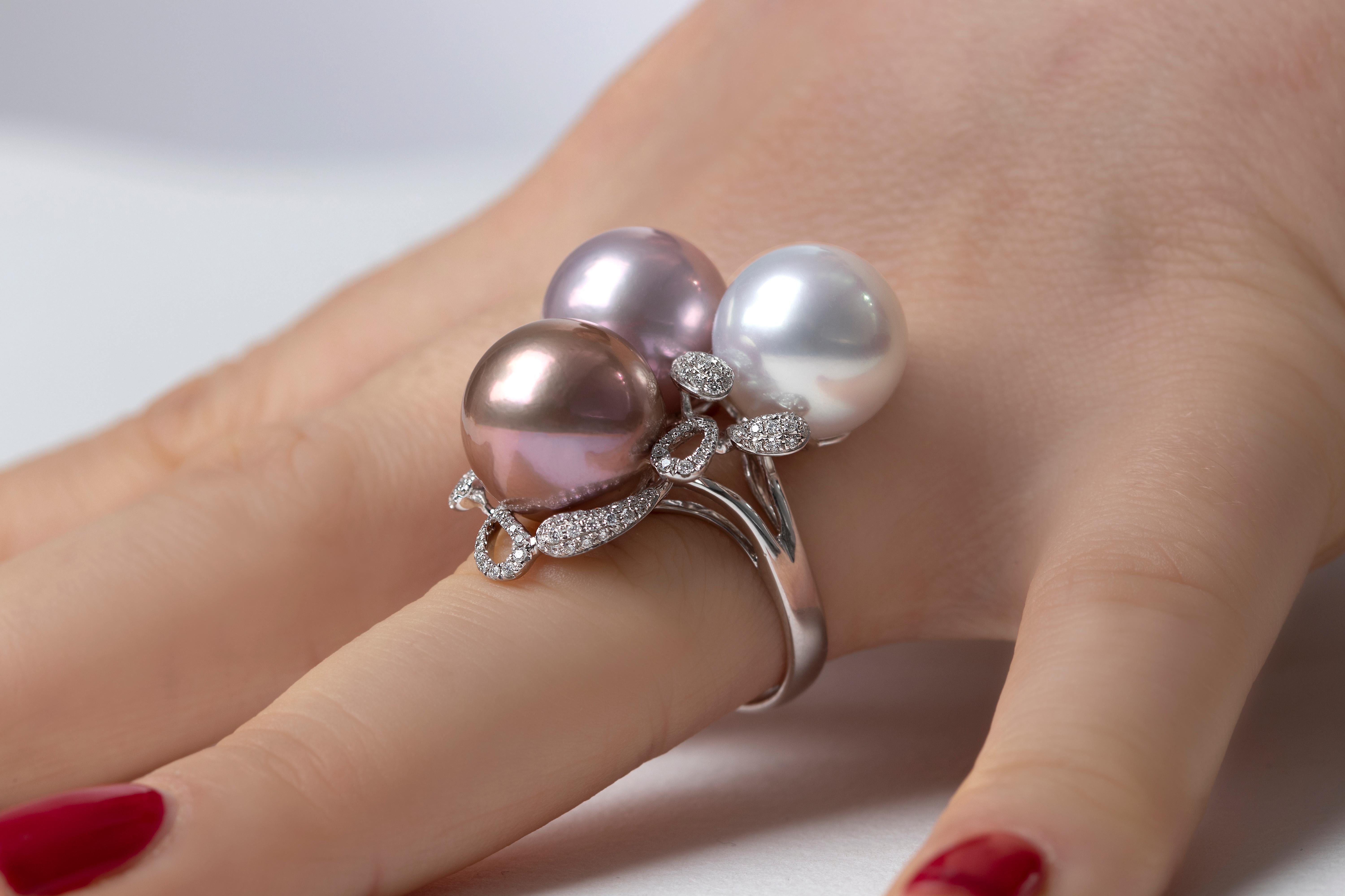 This exquisite ring by Yoko London features a lustrous crisp white South Sea pearl alongside two spectacular pink Freshwater pearls. The exceptional pearls are perfectly offset by the delicate diamonds which surround them. A perfect statement piece,