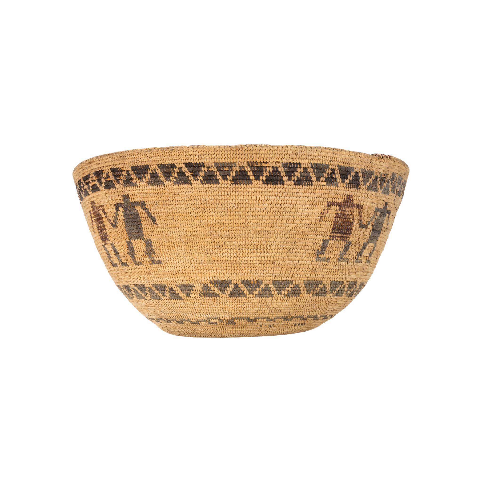 Yokut figurative basket, very fine and tight with much Native use.

Period: 19th century

Origin: Yokut

Size: 15 1/2