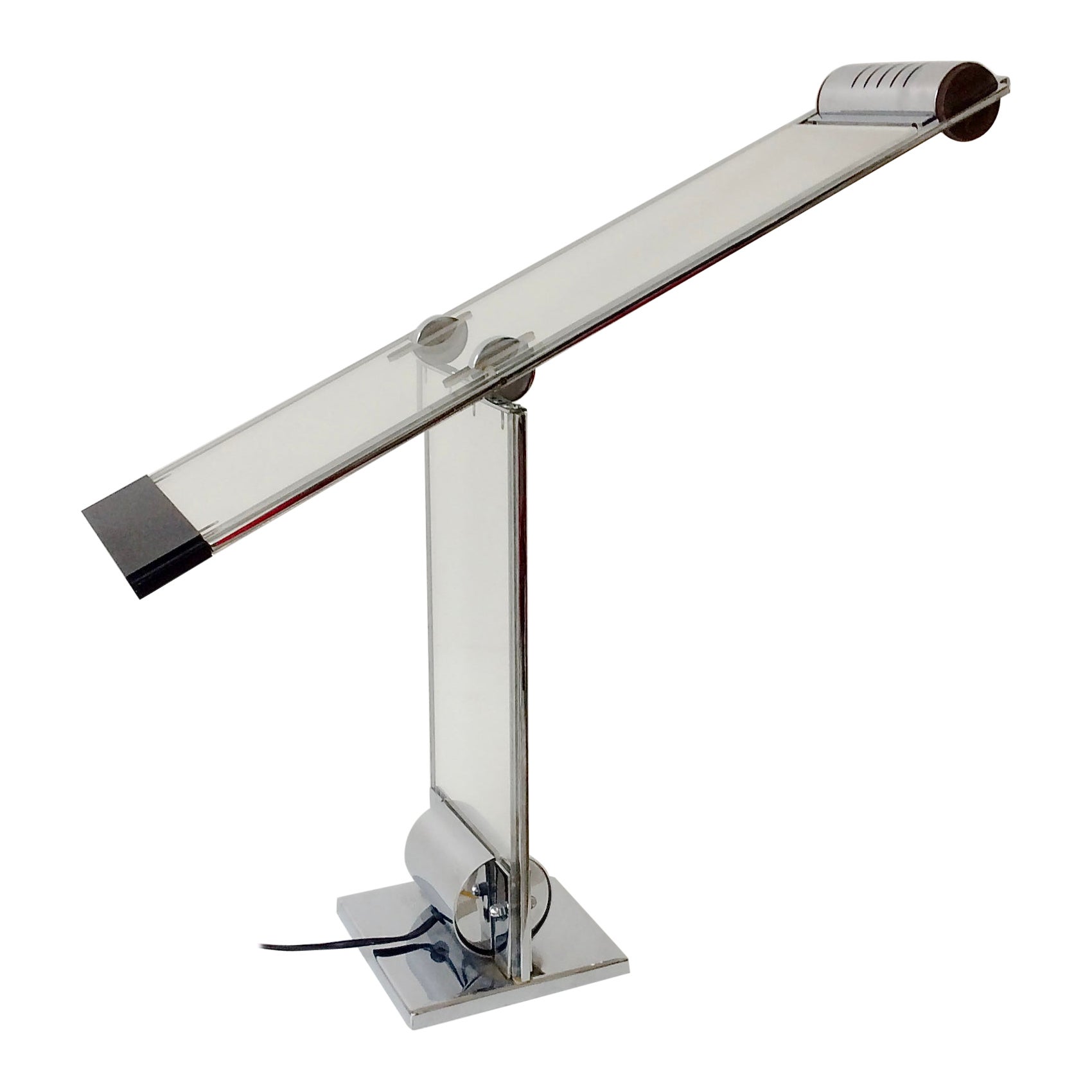 Rare Yonel Lebovici ajustable table lamp, Oblique Cristal model, simple rocker, circa 1979, France.
Polyméthacrylate, chromed steel, halogen bulb.
Dimensions: 80 cm H, 62 cm W, 15 cm D.
Good original condition.
Bibliography: 