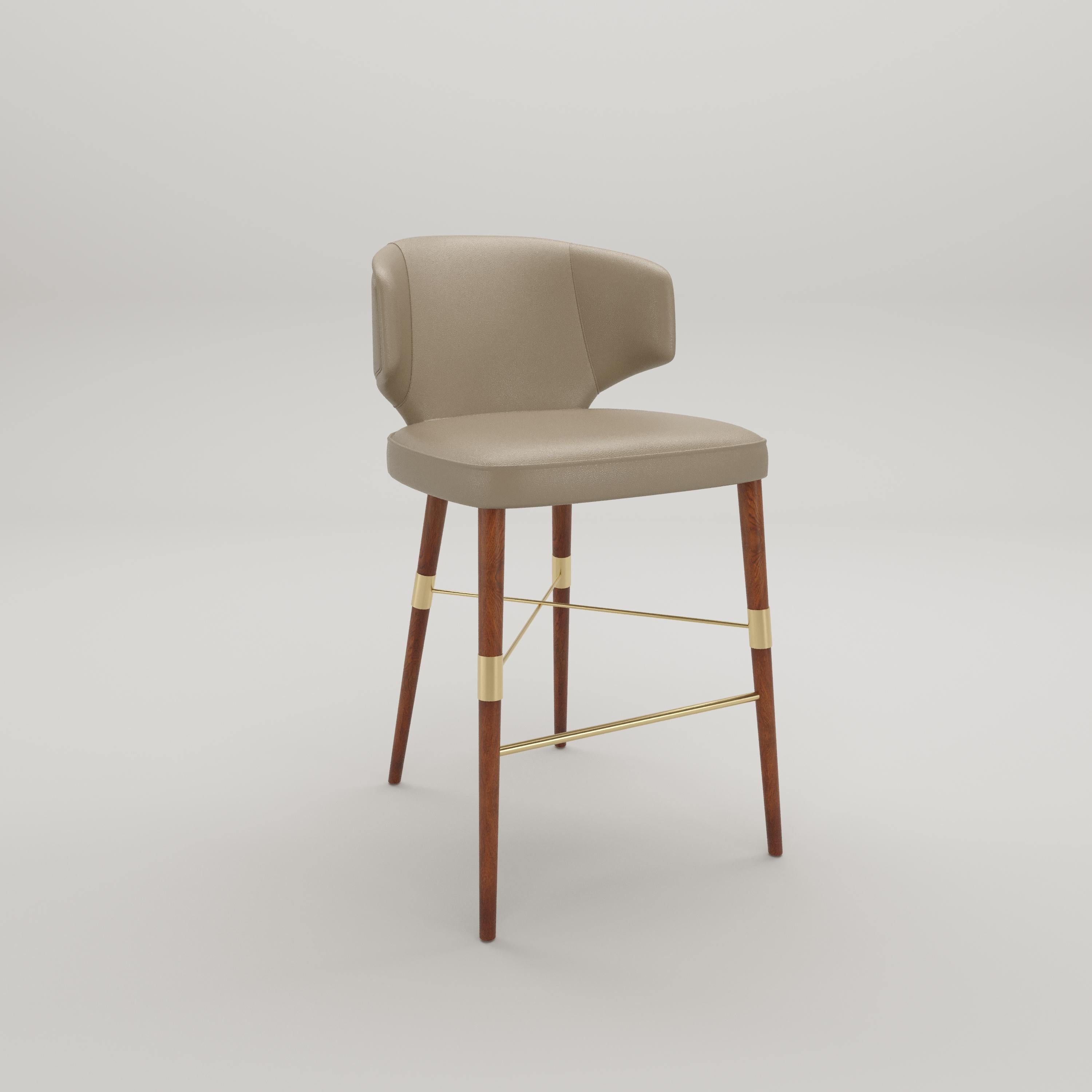 The YORK bar stool is crafted with a design that seamlessly contours to your body, YORK promises unparalleled comfort for those delightful kitchen moments. Its wooden feet, embraced by a sleek metallic structure, exude modern elegance, while the