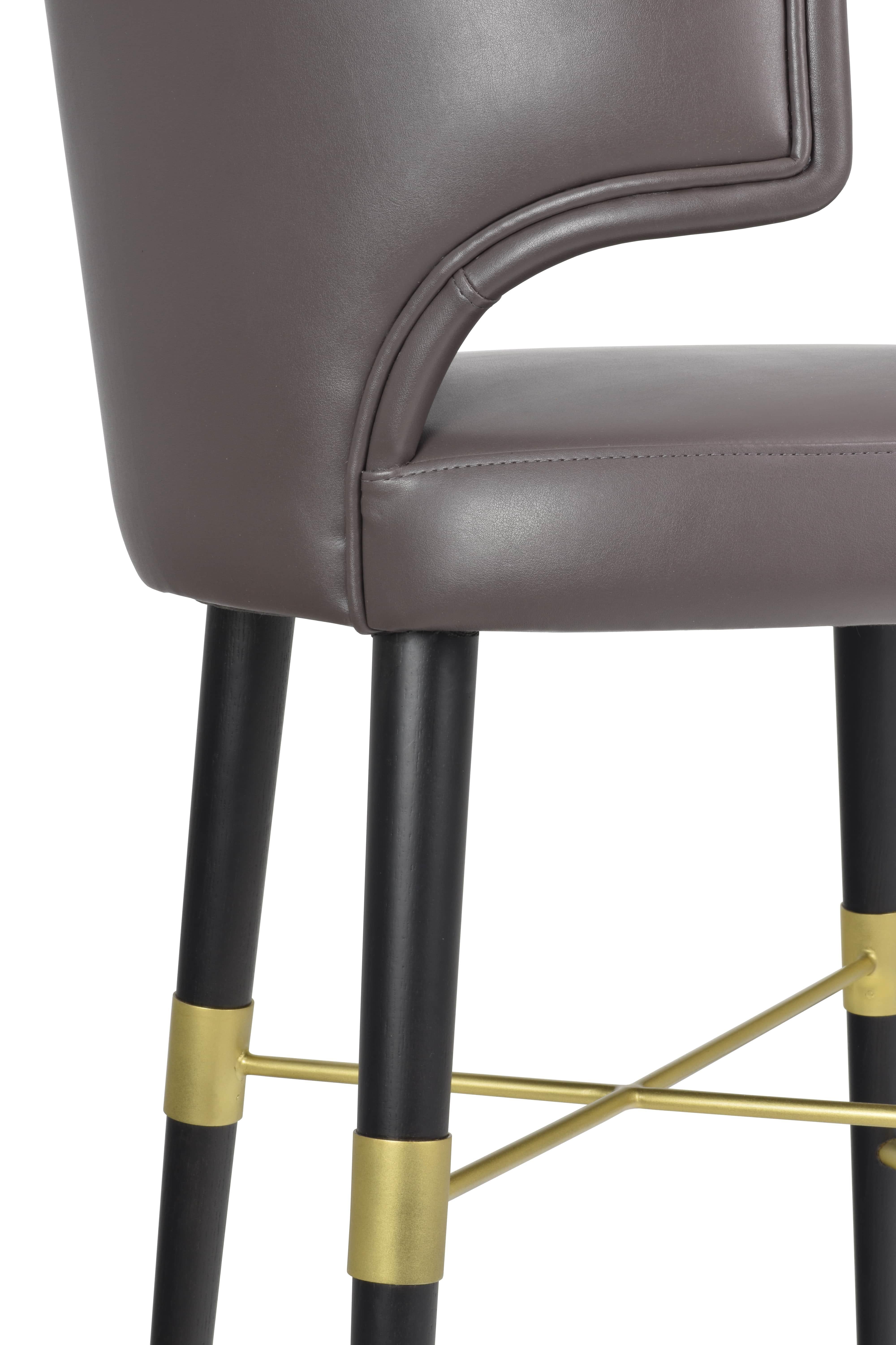 Stained York bar stool with metallic details For Sale