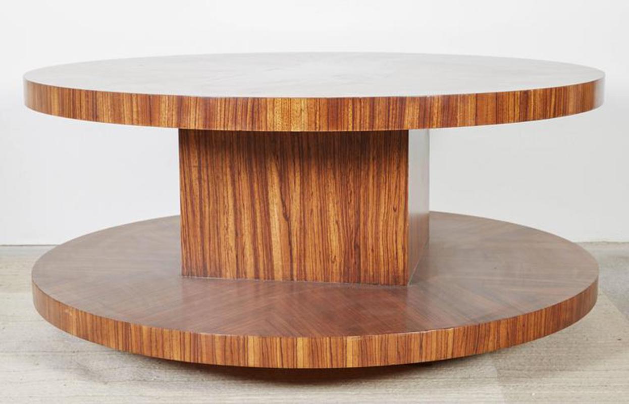 Round, spool shaped coffee table featuring wood veneer detailing. The York Table frame is constructed from maple wood applied with oakwood veneer. Four finishes available.

Dimensions: 42