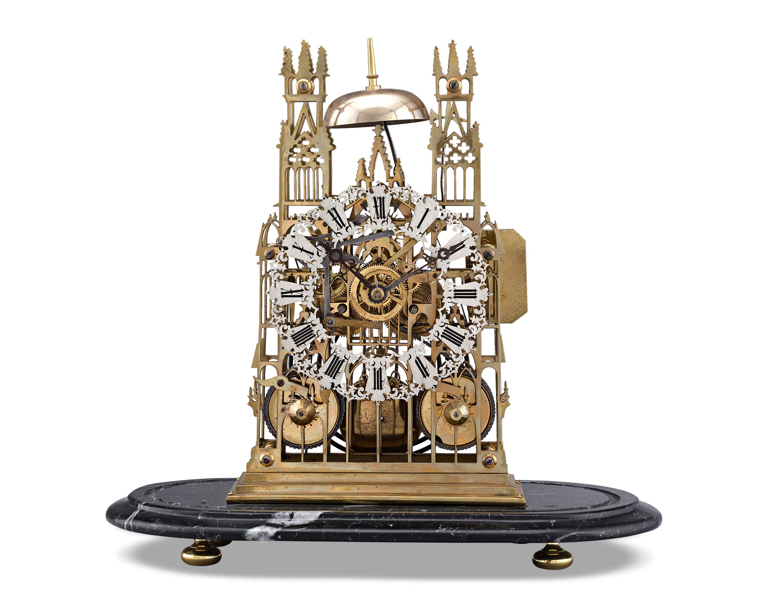 Depicting the majestic York Minster Cathedral in York, England, this remarkable Victorian brass skeleton clock is a wonderful specimen of English clockmaking attributed to J. Smith & Sons of Clerkenwell, London. Known alternatively as a 