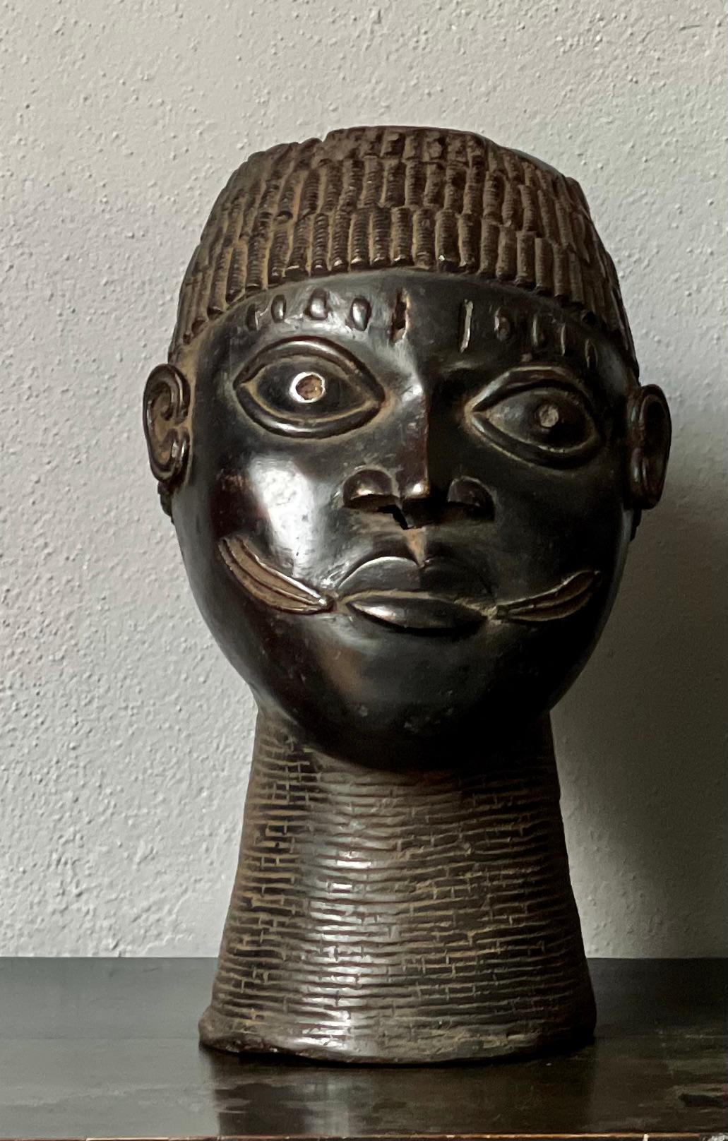 Made by the Yoruba Tribe from Benin. Created for the royal palace & for the Oba (King), this hand-crafted bronze will add spirit & attract attention wherever it is!.
 