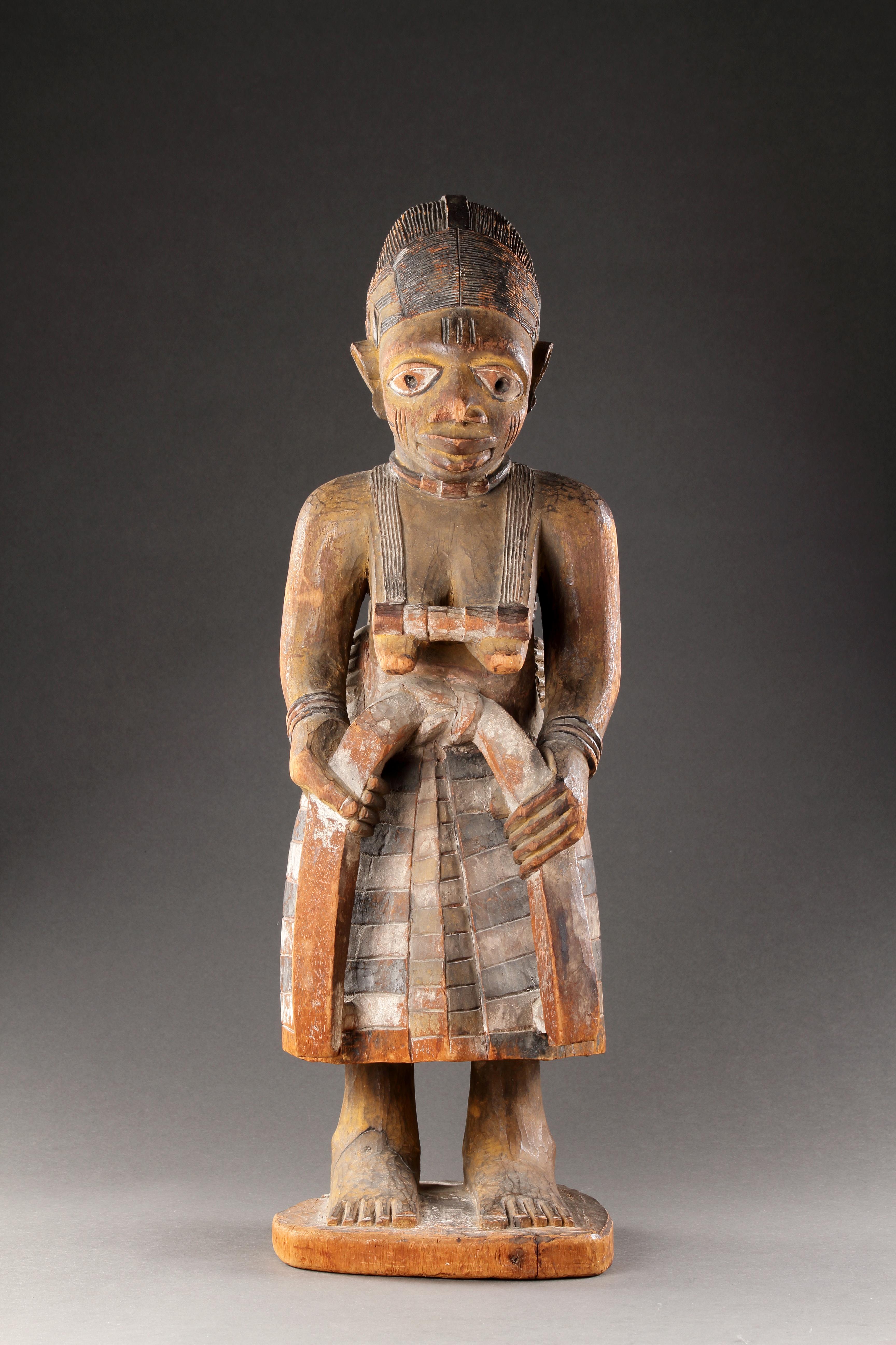 Yoruba Maternity Group 
Wood, polychrome, pigment, scorching
Old collection name to base: ‘Sealy’ and ‘16.’ 
Nigeria 
Late 19th Century 

SIZE: 58cm high - 22¾ ins high 

PROVENANCE:
Ex Ernest Ohly collection
Ex Berkeley Gallery, London 
Purchased