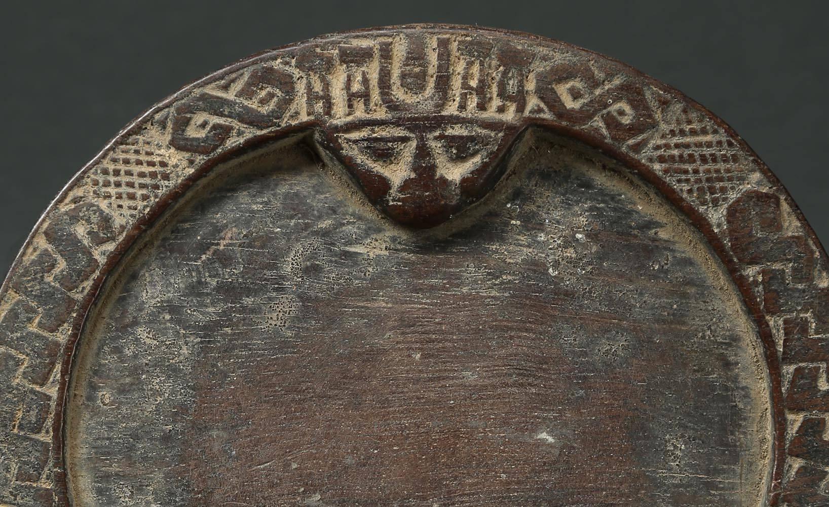 Offered by Scott McCue
Yoruba miniature tribal divination plate, Nigeria.

Diviners among the Yoruba People of Nigeria use plates on which they cast items and read the results. This is an unusually small very finely worked plate, 6 1/2