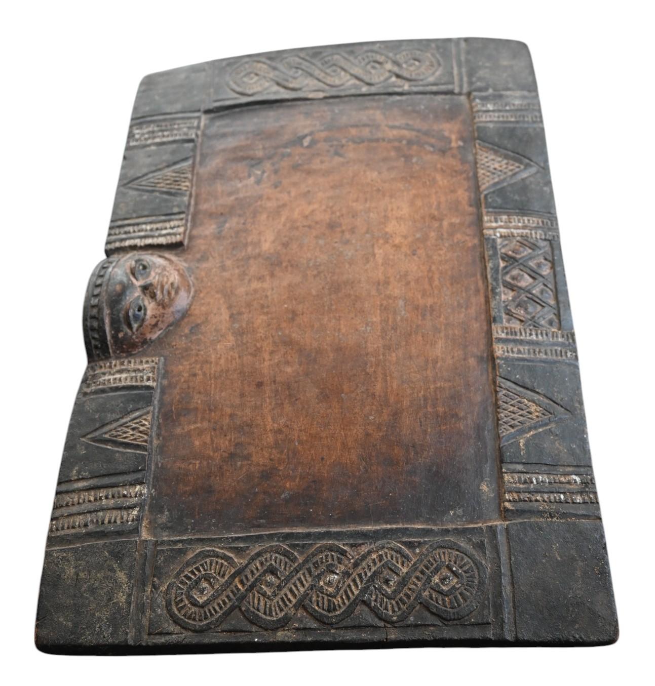 Tribal Yoruba, Nigeria, carved wooden 'OPON IFA' divination board