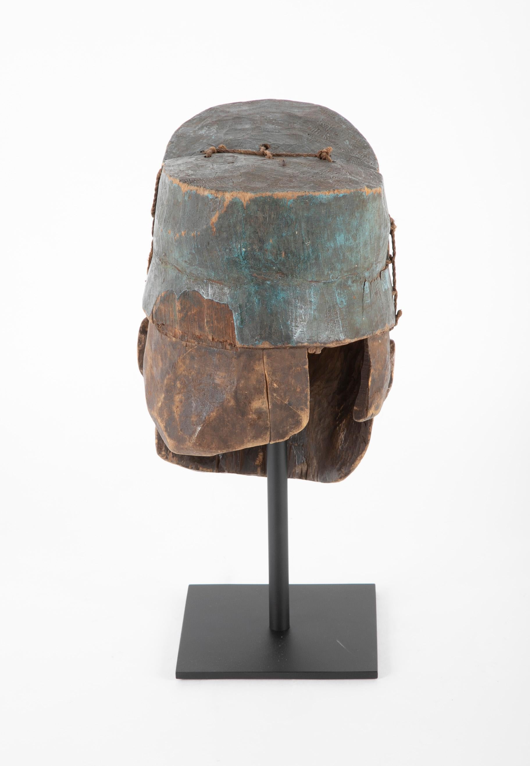 Wood Yoruba Tribal Helmet Mask of a French Gendarme For Sale