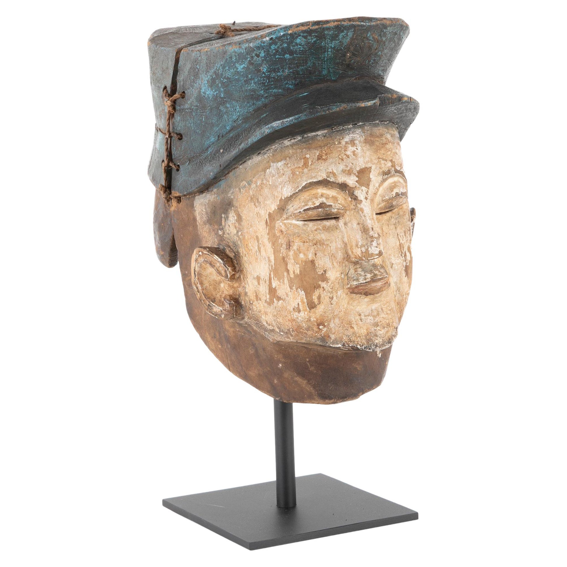 Yoruba Tribal Helmet Mask of a French Gendarme