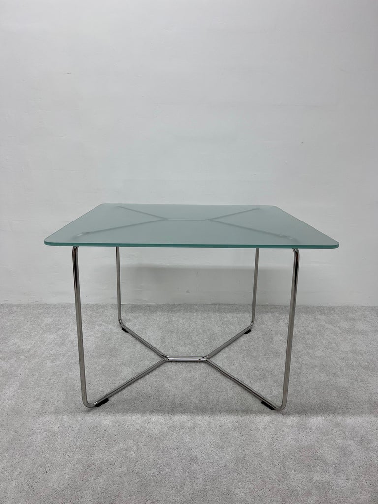 Tubular chrome frame with frosted green glass top dining table from the Origin Series by Yos & Leonardo Theosabrata for Accupunto, 2000s.

Glass: 1/2