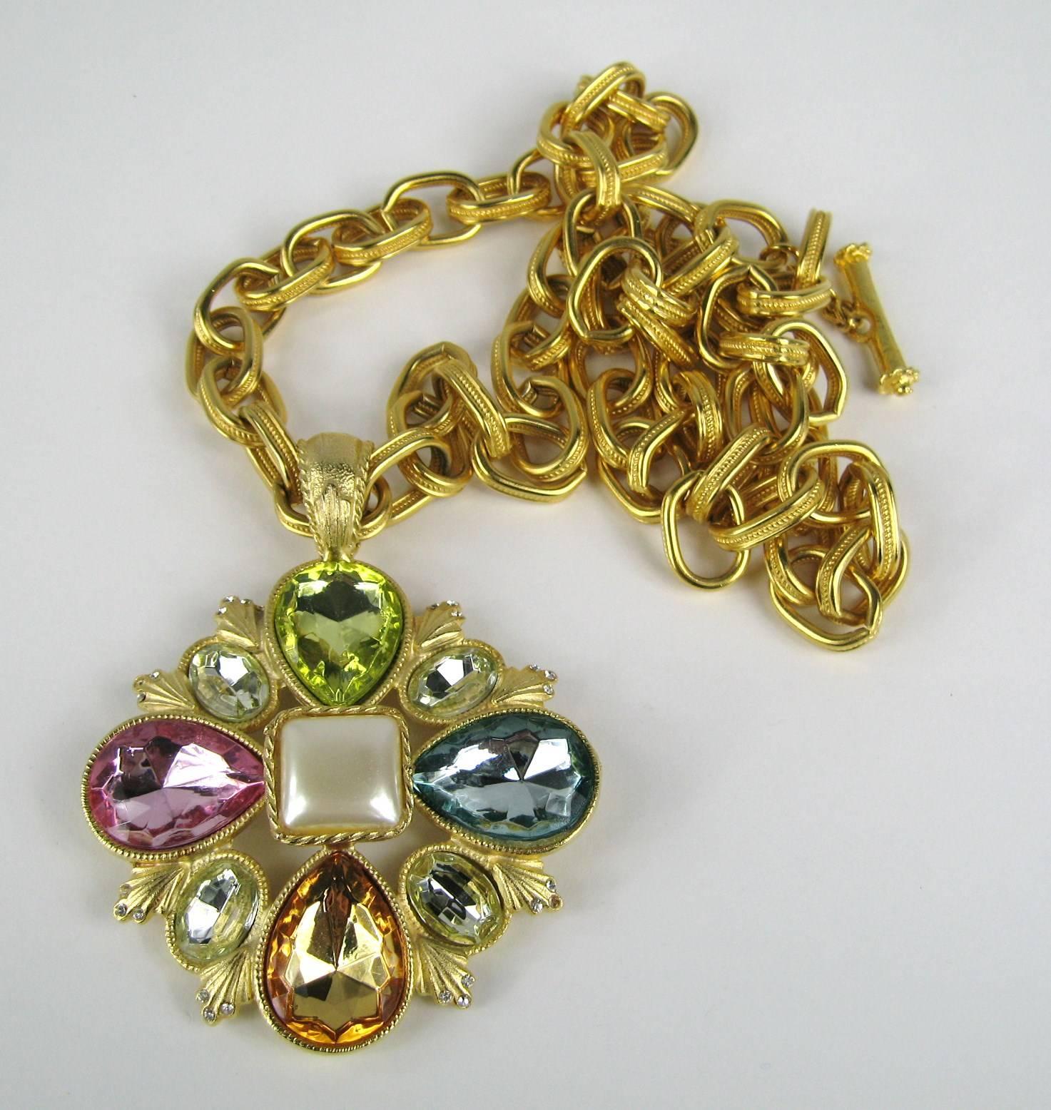 Maltese Cross Gerard Yosca 1980s. Gilt Gold Necklace. Blue, green, pink and amber crystal Faux Pearl center with a Large over sized link chain, Measuring 3.63 in top to bottom  long x 2.73 in  wide and the Chain is 33 in  end to end. This is out of