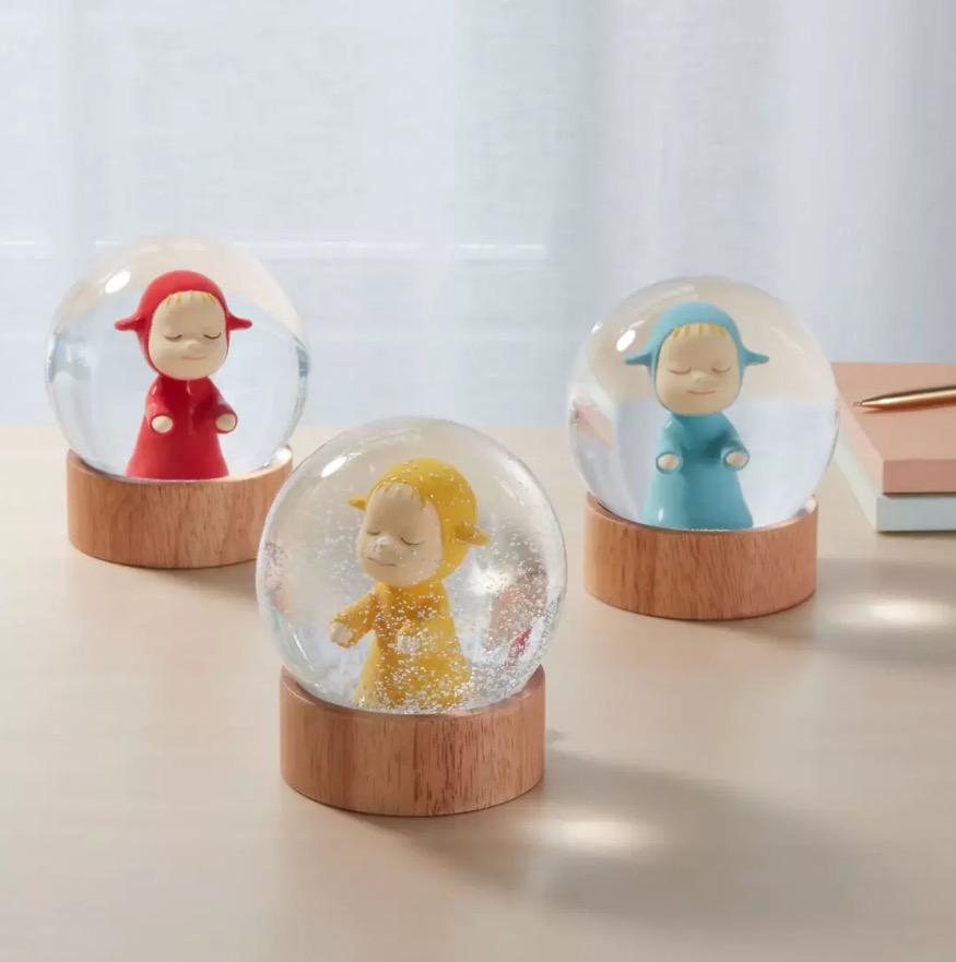Yoshitomo Nara
Little Wanderer Snow Globe (Yellow), 2023
Resin, glass, rubberwood
4 1/2 × 4 × 4 in  11.4 × 10.2 × 10.2 cm

Yoshitomo Nara’s Little Wanderer—a  character based on his 1999 sculptures Little Pilgrims (Night Walking)—has found a home in