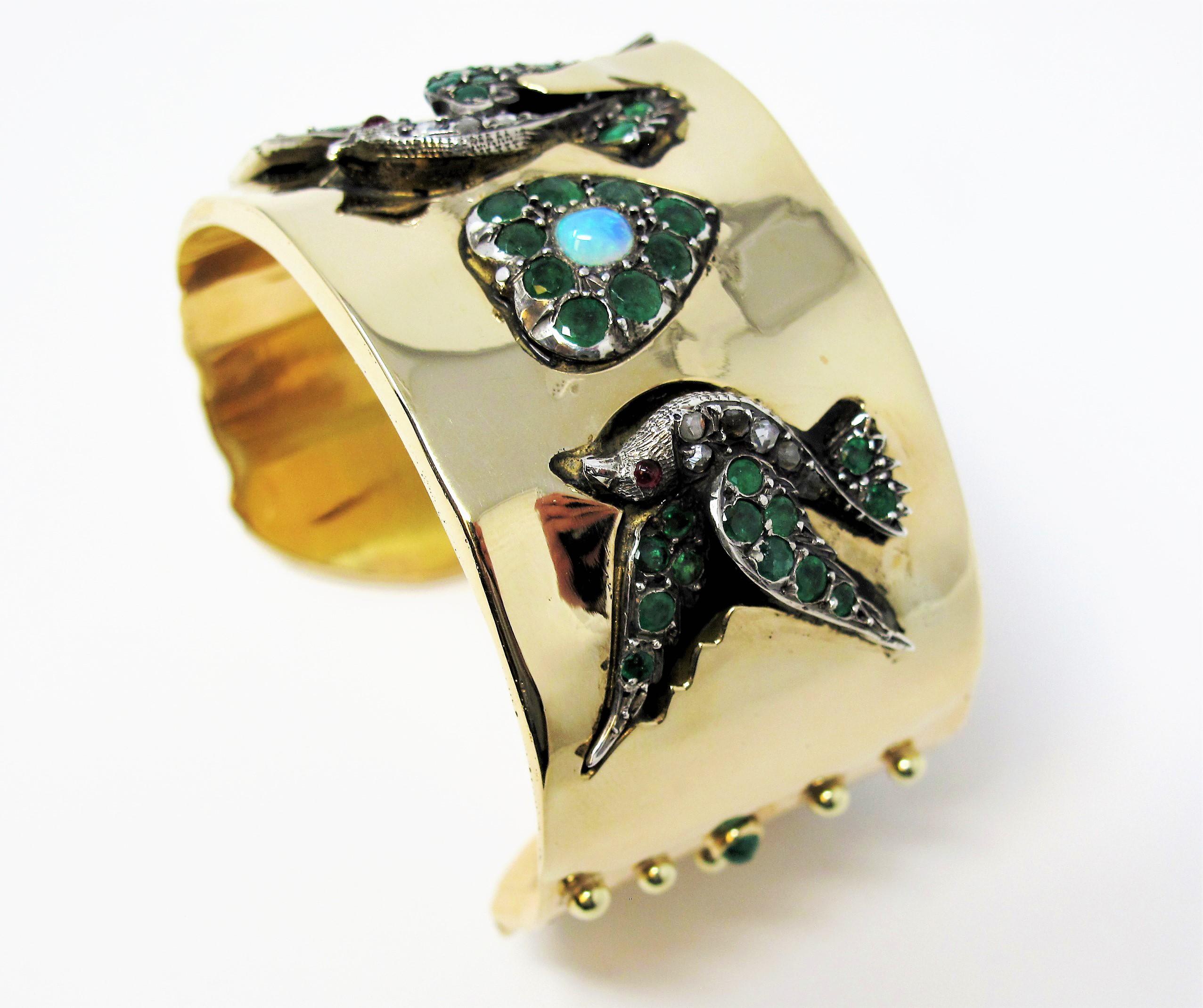 Incredible, one of a kind custom embellished gold cuff bracelet by renowned jeweler, Yossi Gabay. This remarkable piece will draw plenty of attention to your wrist with its bold, colorful design, meticulous attention to detail, and unique