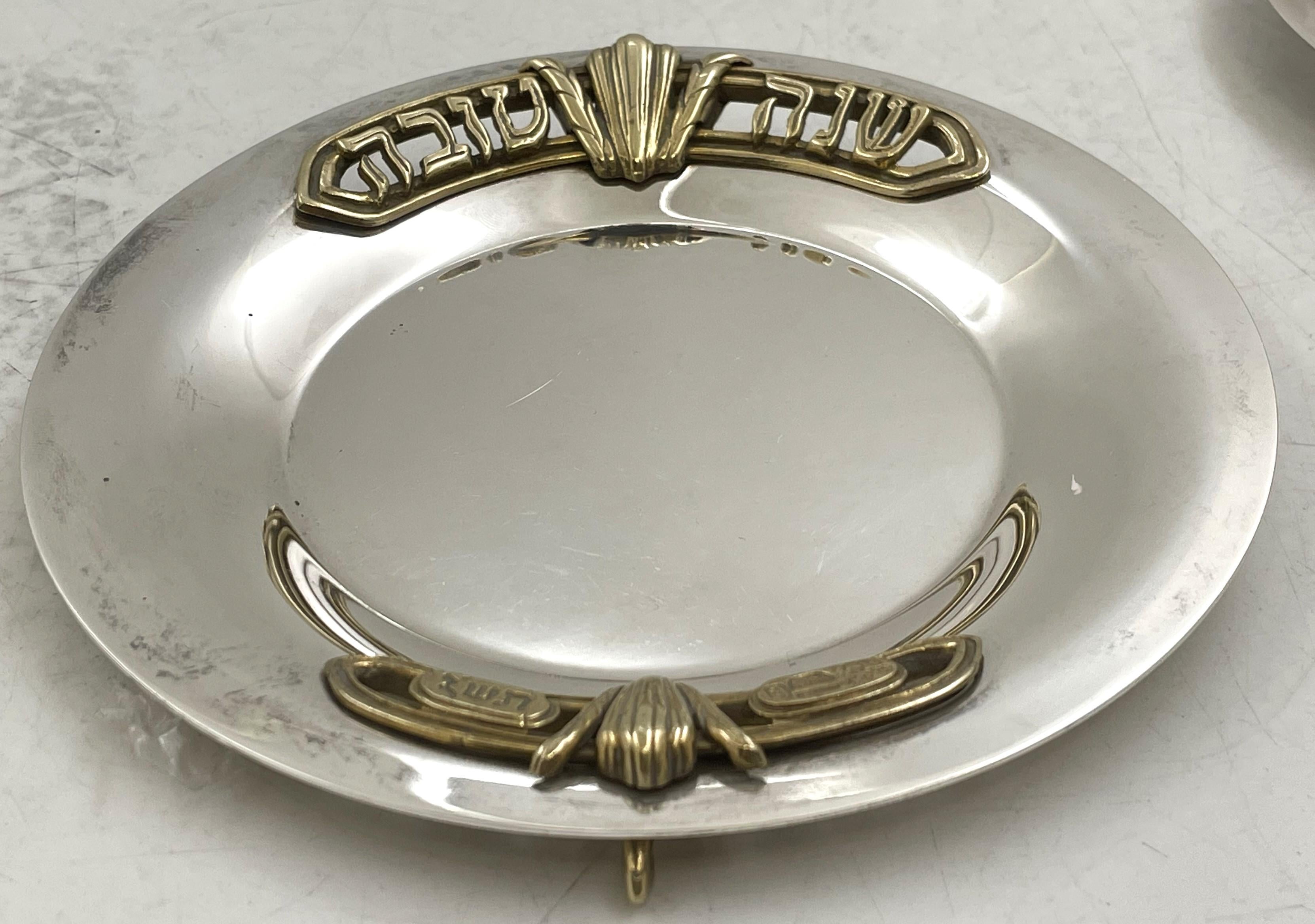 Swed Masters (Yossi & Dudik Swed) Rosh Hashanah honey set consisting of 2 brass and sterling silver honey dishes, measuring 2 1/4'' in height by 4'' in diameter, numbered 38 and 68 from a limited edition of 250, and 3 stainless steel and brass