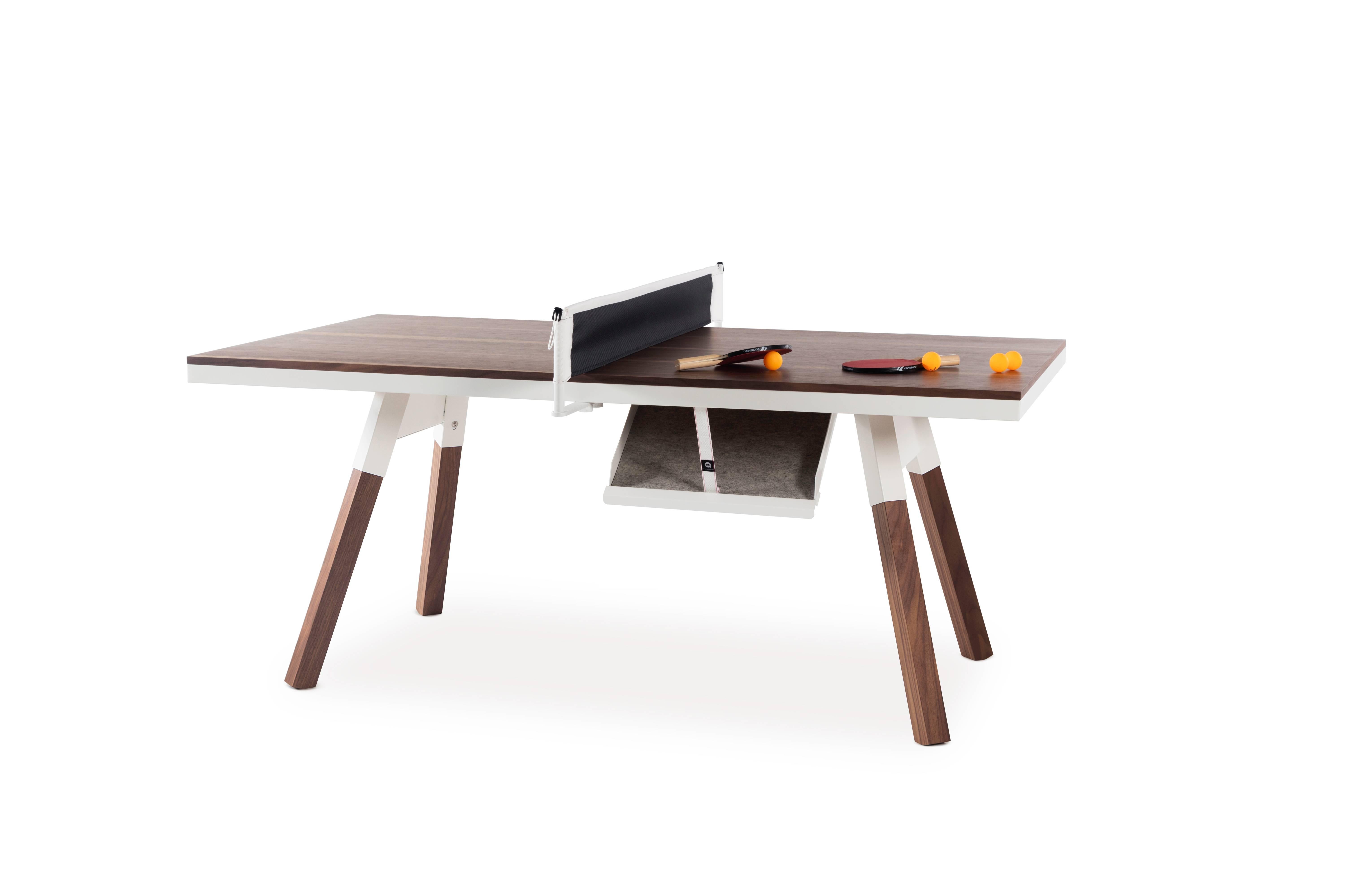 With our wood topped Small You and Me ping-pong table, we’ve taken our playful attitude indoors. Wood offers comfort and elegance, while sportiness blends in seamlessly in new settings. There’s a place for everything with a You and Me. There’s a