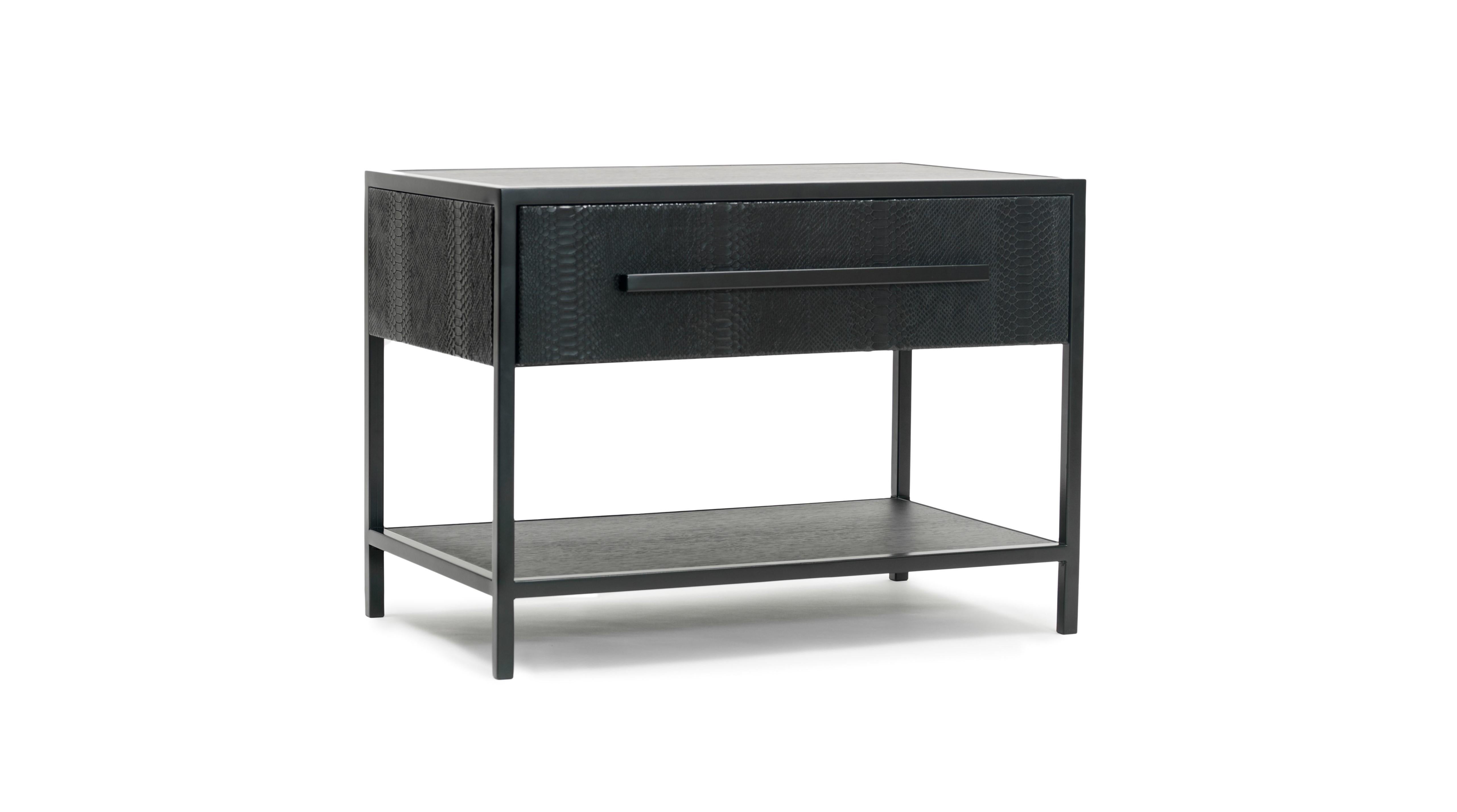 Combining function and design, the bed sidetable you shook me all night long pays homage to the different dimensions and textures of the color black. Its seemingly simple form allows the mix of materials to shine in a rich game of contrast.
