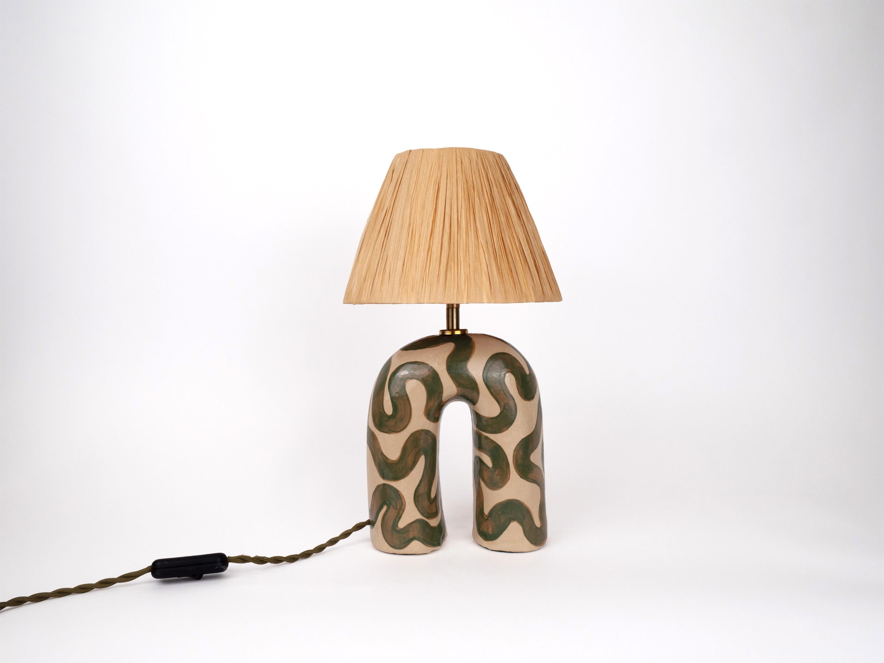 Cream and Green lamp base with a glossy finish paired with a Sand raffia shade

Bulb NOT included
Recommended bulb fitting: E27/26 
Recommended bulb type: Mini Globe LED

The estimated processing time is 2 weeks from order confirmation.

As each