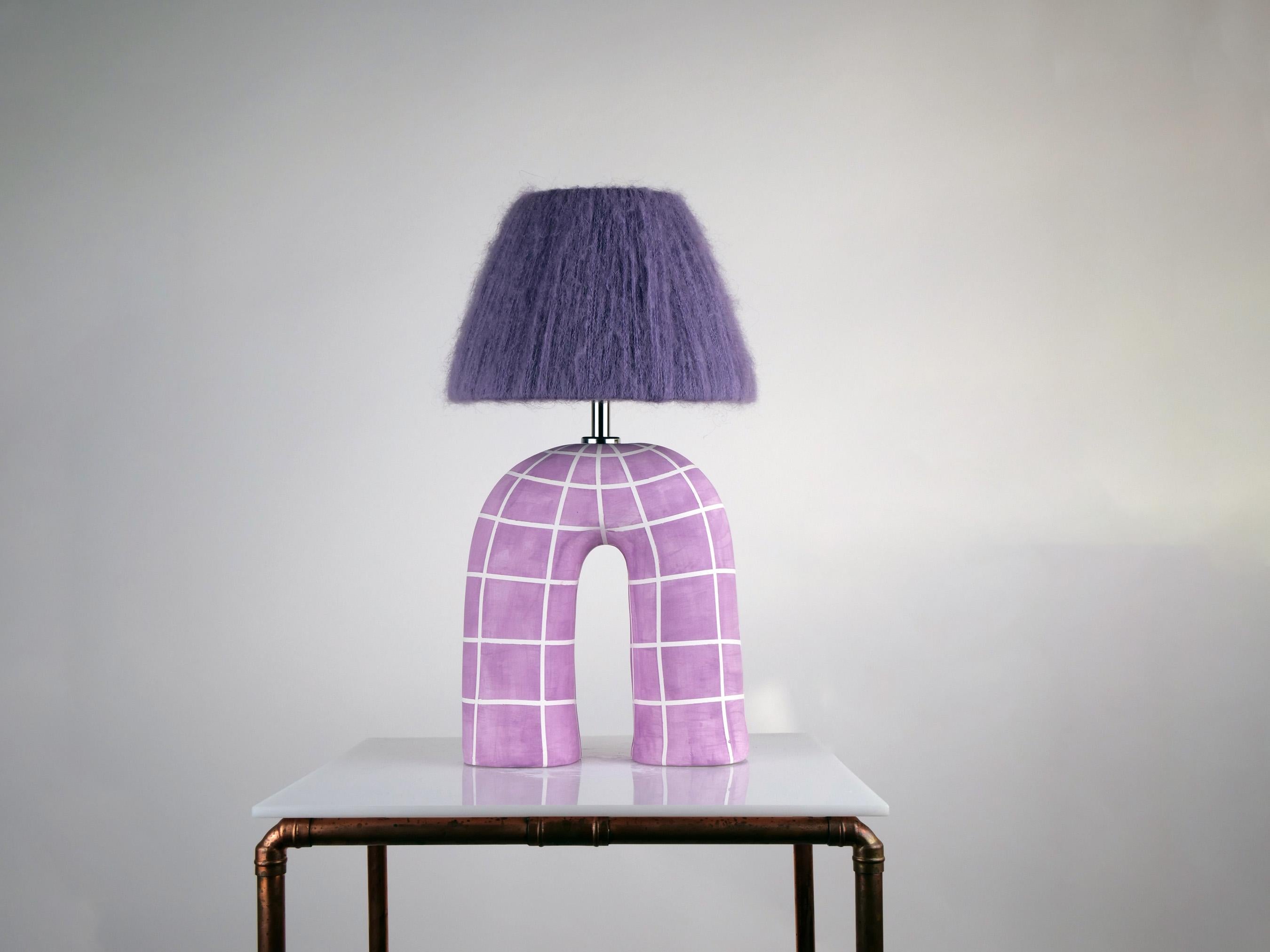 White and purple check pattern with a matte finish and purple mohair shade

Estimated processing time is 2 weeks from order confirmation.

Pictured with a Mini Globe LED E27 Bulb. Bulb not included.

As each item is hand-built, there may be