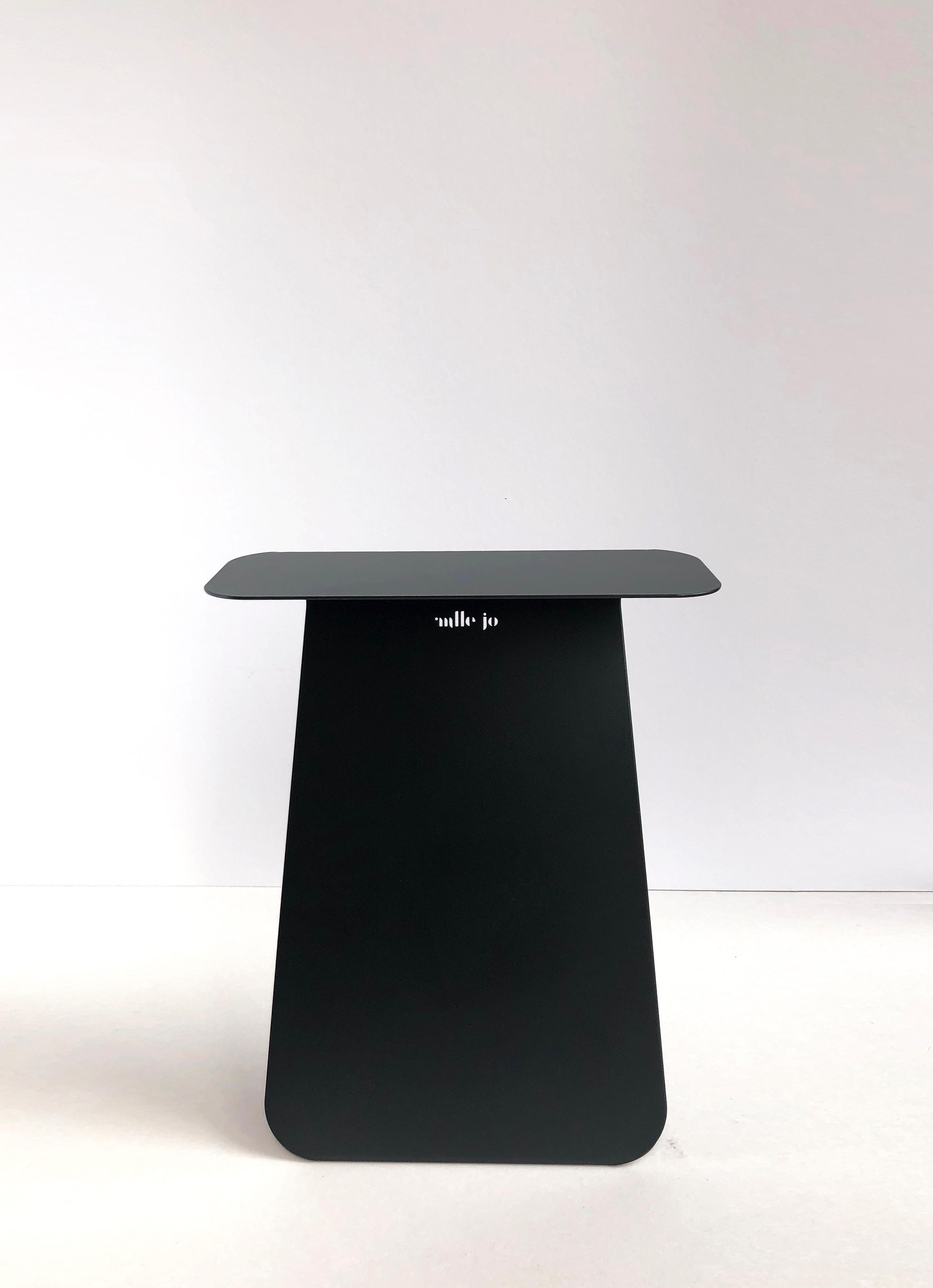 YOUMY Round Black Table by Mademoiselle Jo
Dimensions: Ø 36 x H 43 cm.
Materials: Matte black steel.

Also available in different colors and finishes. Round symmetrical or rectangular asymmetrical version. Available in two versions and several