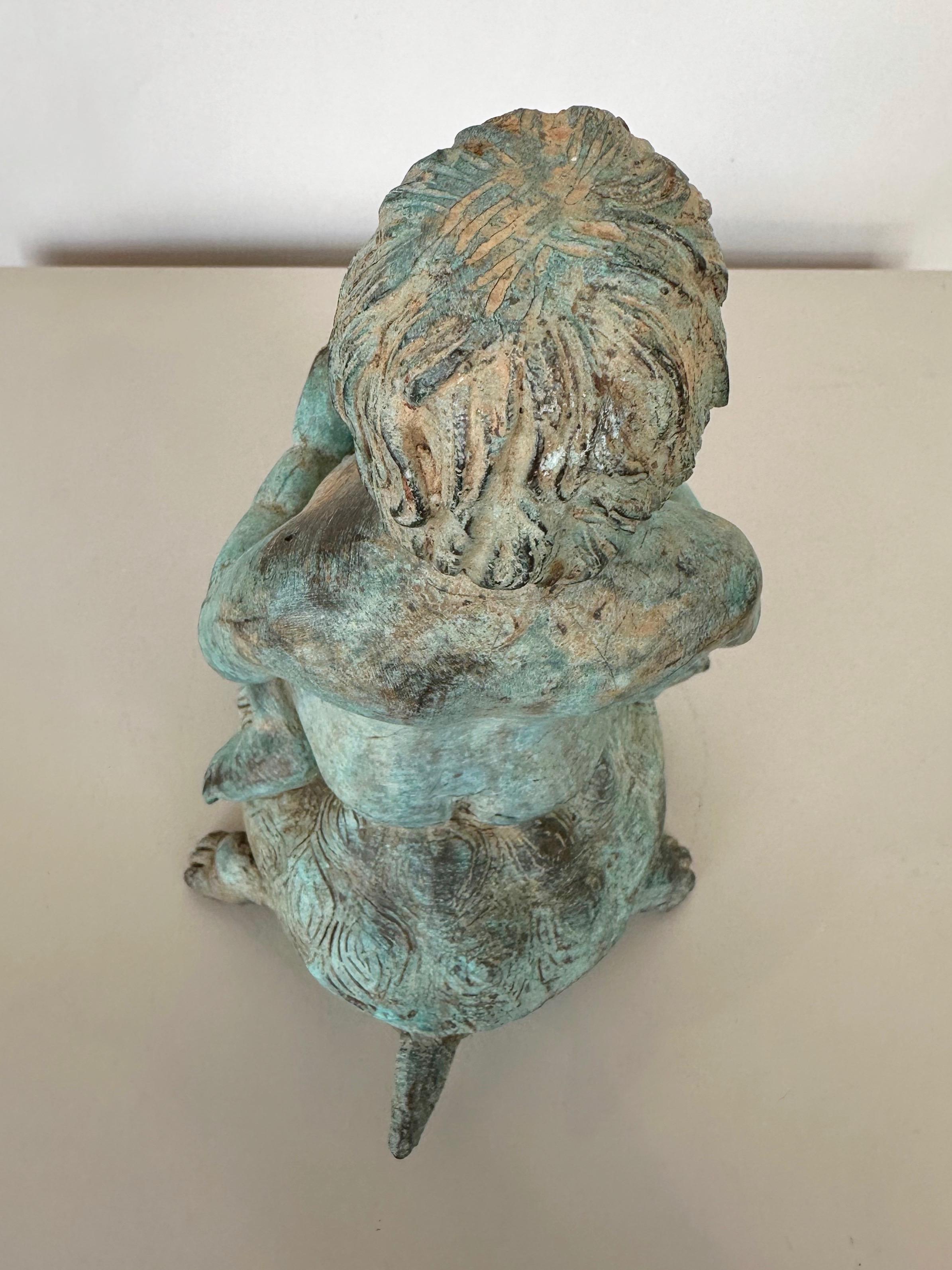 Patinierte Bronzeskulptur eines jungen Jungen, der auf einer Schildkröte reitet, Brunnenkopf, um 1920 im Angebot 13