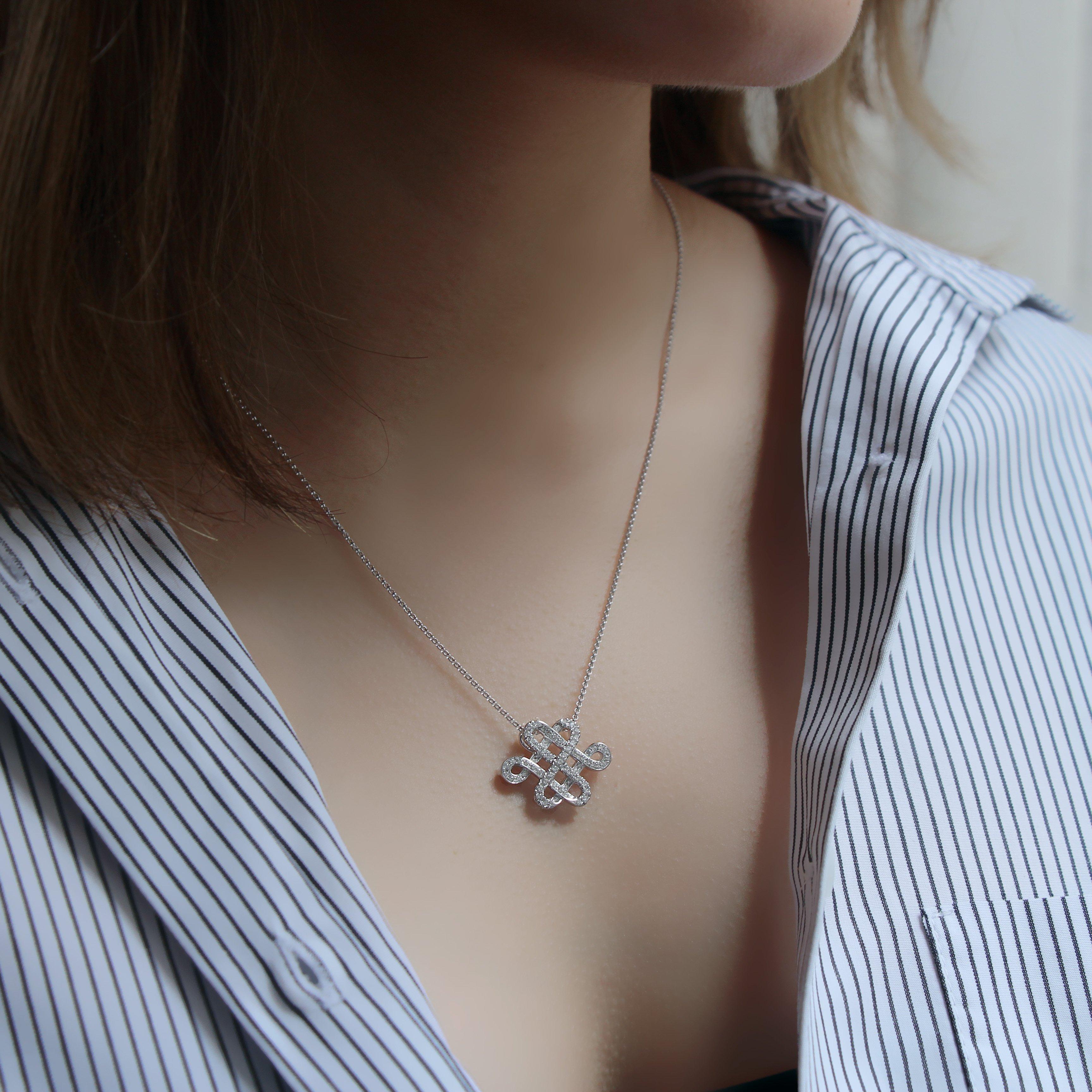 Belonging to the sacred suite of Eight Auspicious Symbols found in Buddhism, the Eternal Knot signifies key aspects of Buddhist teaching - wisdom, compassion and continuity. Inspired by this symbol, the Legacy Eternal Knot Necklace elegantly