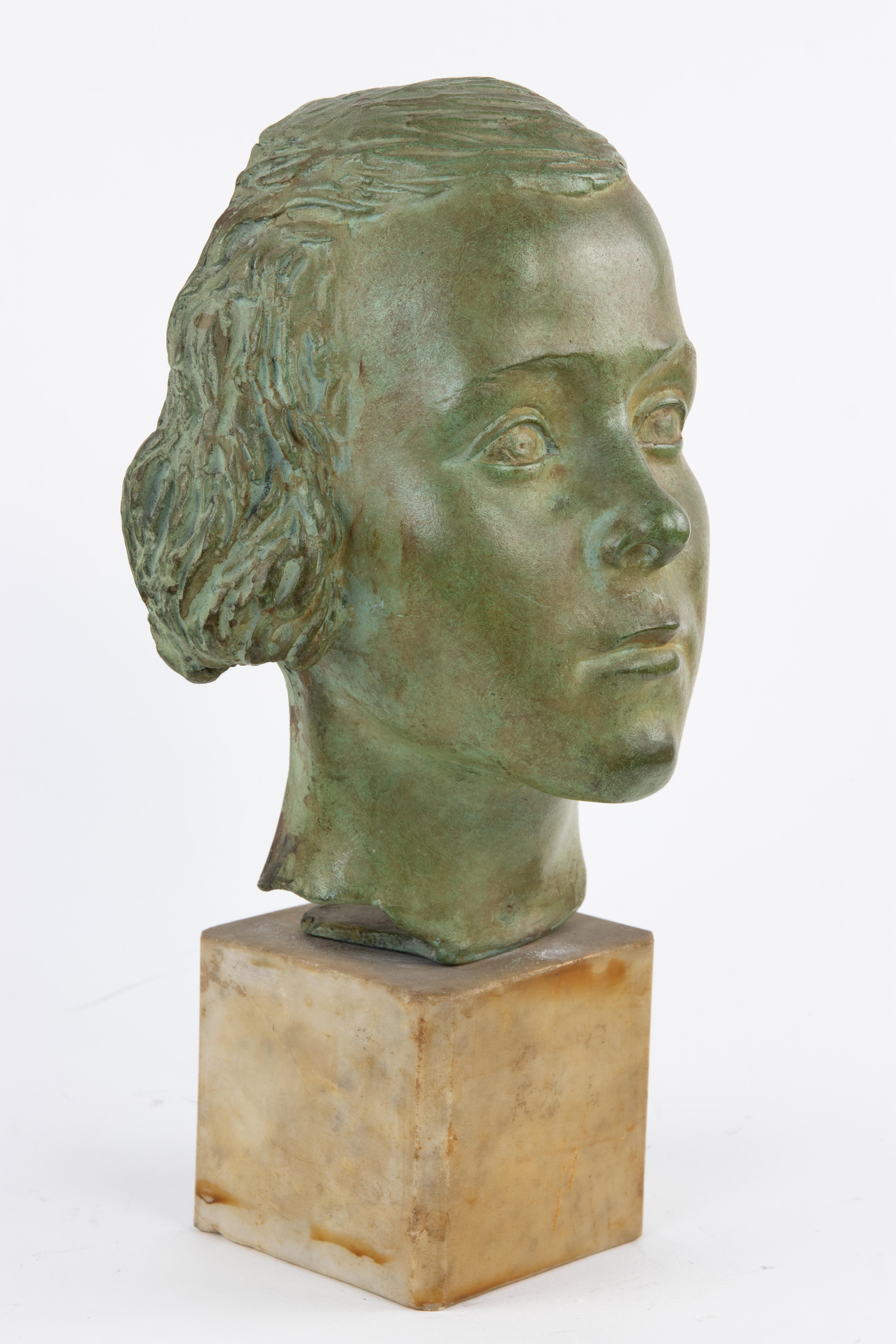 Nice bronze sculpture representing a young girl portrait, with a marble bottom.

Its creator, Attilio Torresini, was an Italian sculptor, who learned the marble art from the marbleworker father firstly and then to the Academy of Fine Arts in
