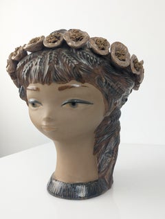 Young girl head vase with flowers and spikes of stoneware Lladró 1970s