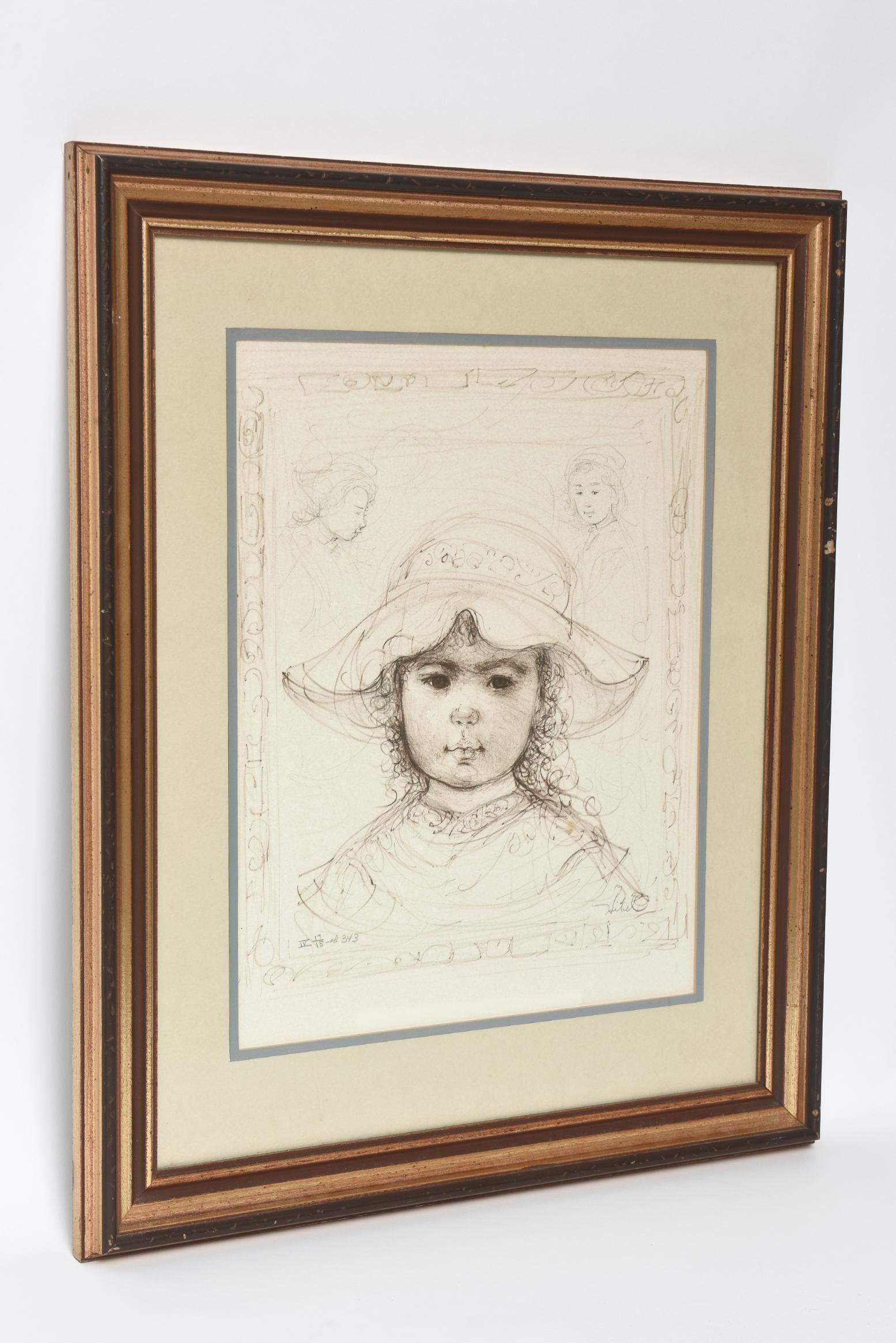 Lithograph print of a young girl wearing a floppy hat by Edna Hibel (American 1917-2014). Signed bottom right 