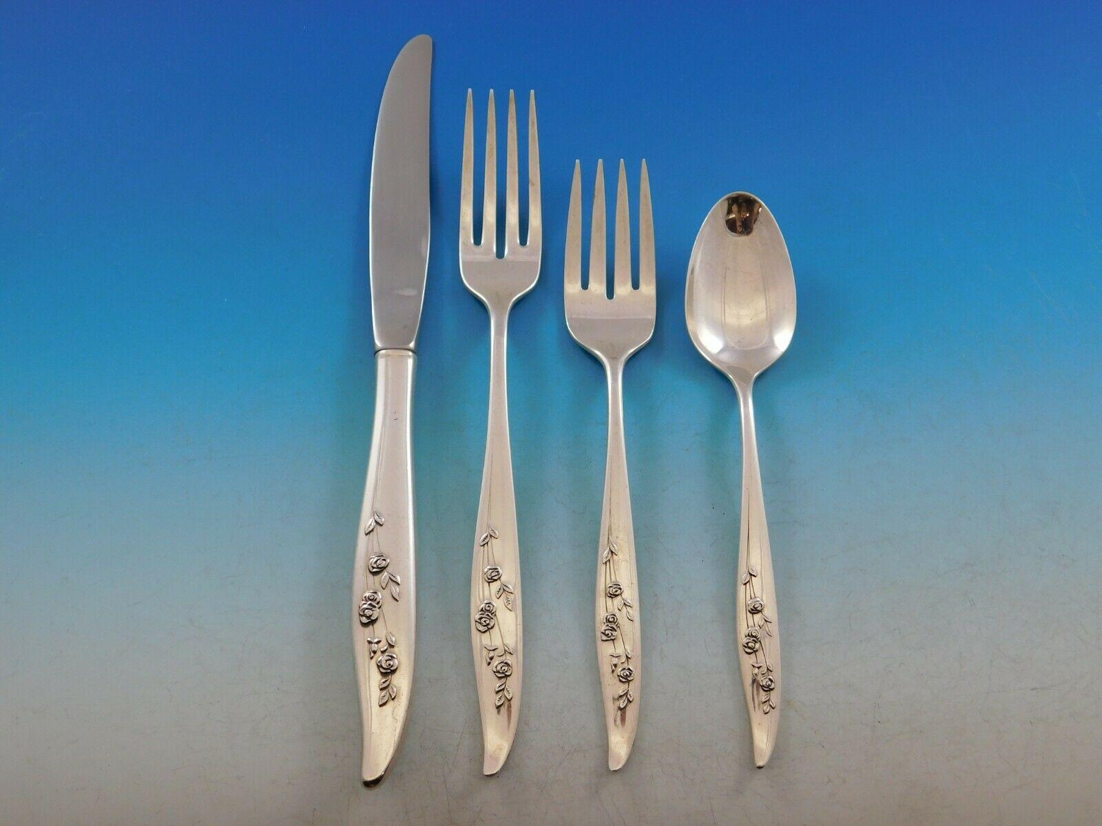 Young Love by Oneida sterling silver flatware set - 32 pieces. This set includes:

 8 knives, 9