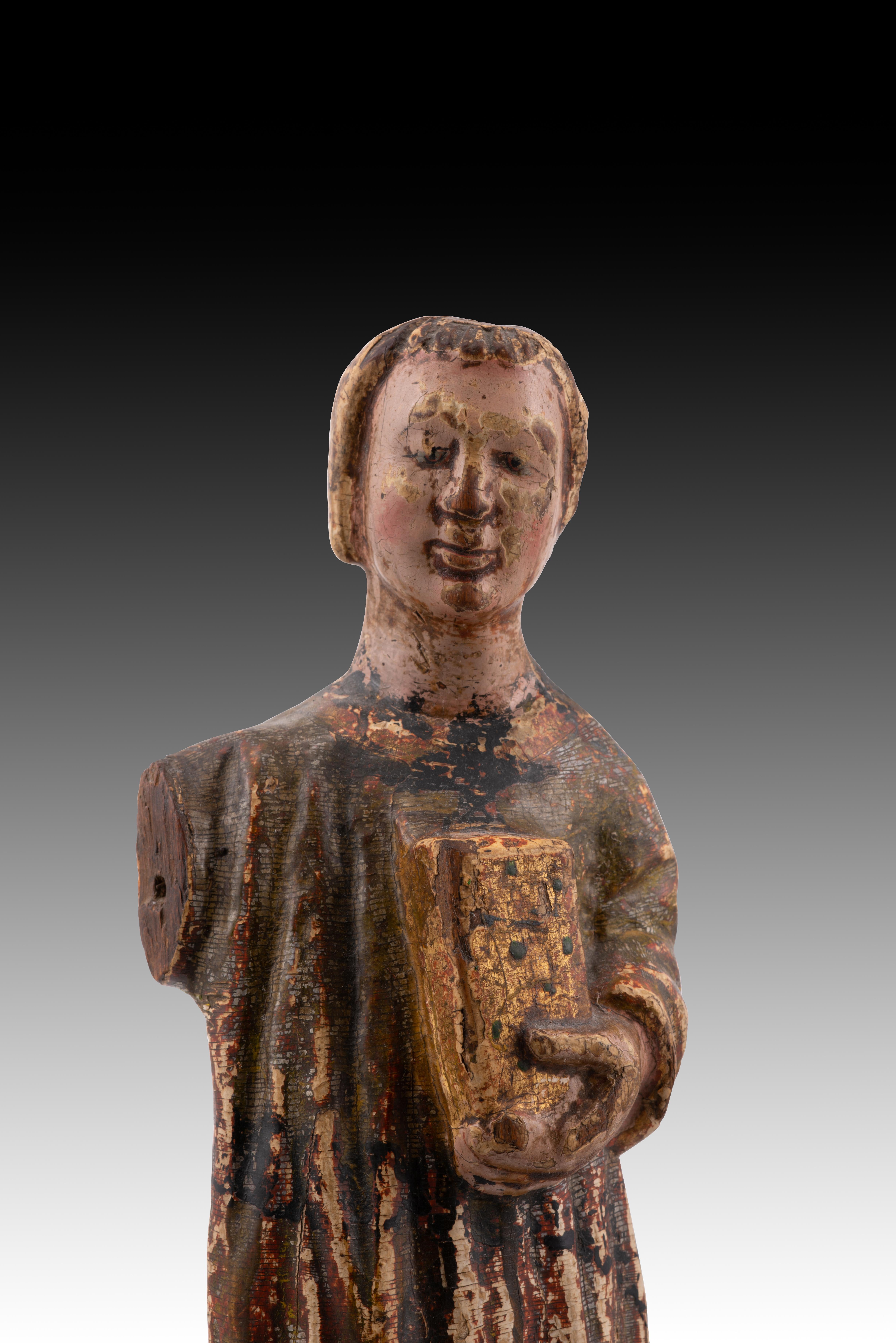 18th Century and Earlier Young man in a tunic. Carved and polychrome wood. Spanish school, 14th century.