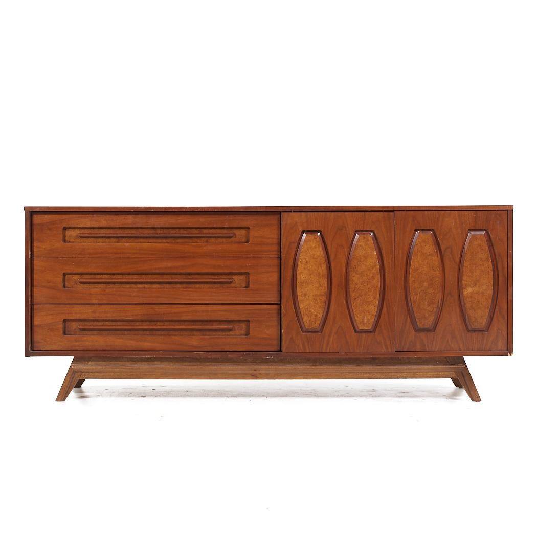 Young Manufacturing Mid Century Walnut and Burlwood Lowboy Dresser

This lowboy measures: 78 wide x 20 deep x 31.5 inches high

All pieces of furniture can be had in what we call restored vintage condition. That means the piece is restored upon