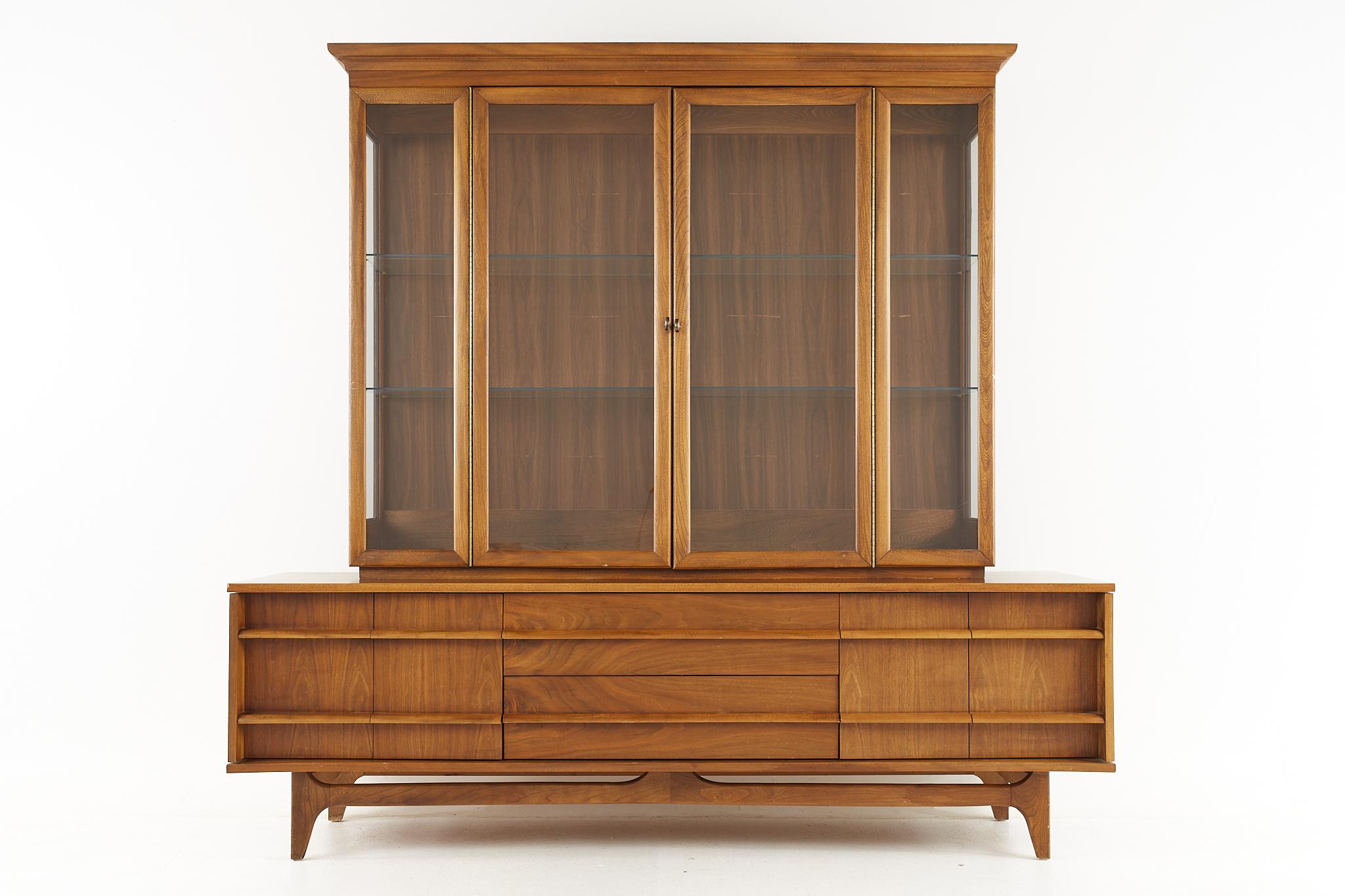 Young manufacturing mid century walnut buffet and hutch

The buffet measures: 78 wide x 19 deep x 74 inches high
The hutch measures: 60 wide x 12.5 deep x 49.25 inches high

All pieces of furniture can be had in what we call restored vintage