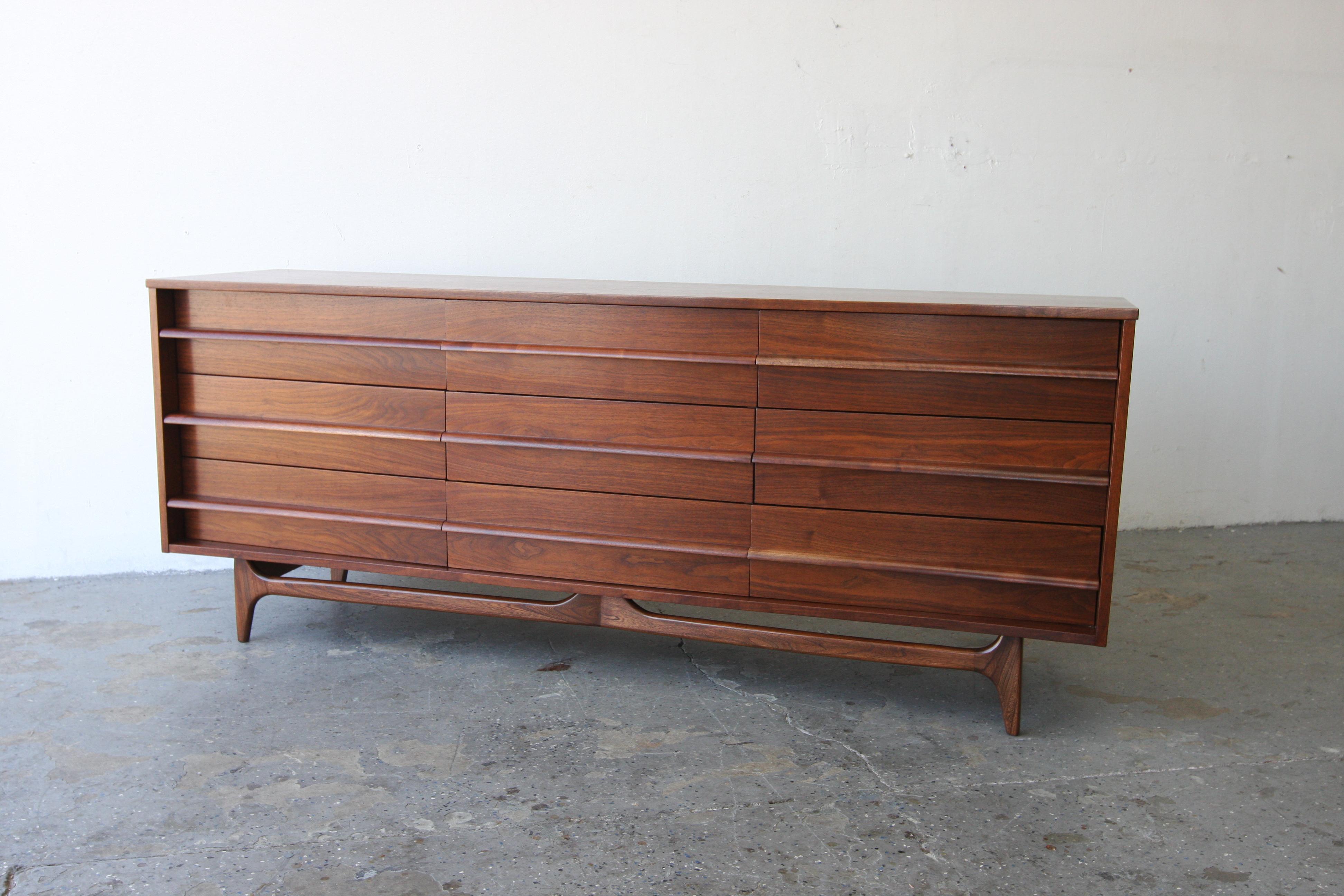 American Young Manufacturing Mid Century Walnut Curved Lowboy 9 Drawer Dresser For Sale