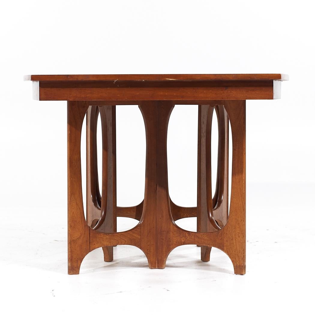 American Young Manufacturing Mid Century Walnut Expanding Dining Table with 2 Leaves For Sale